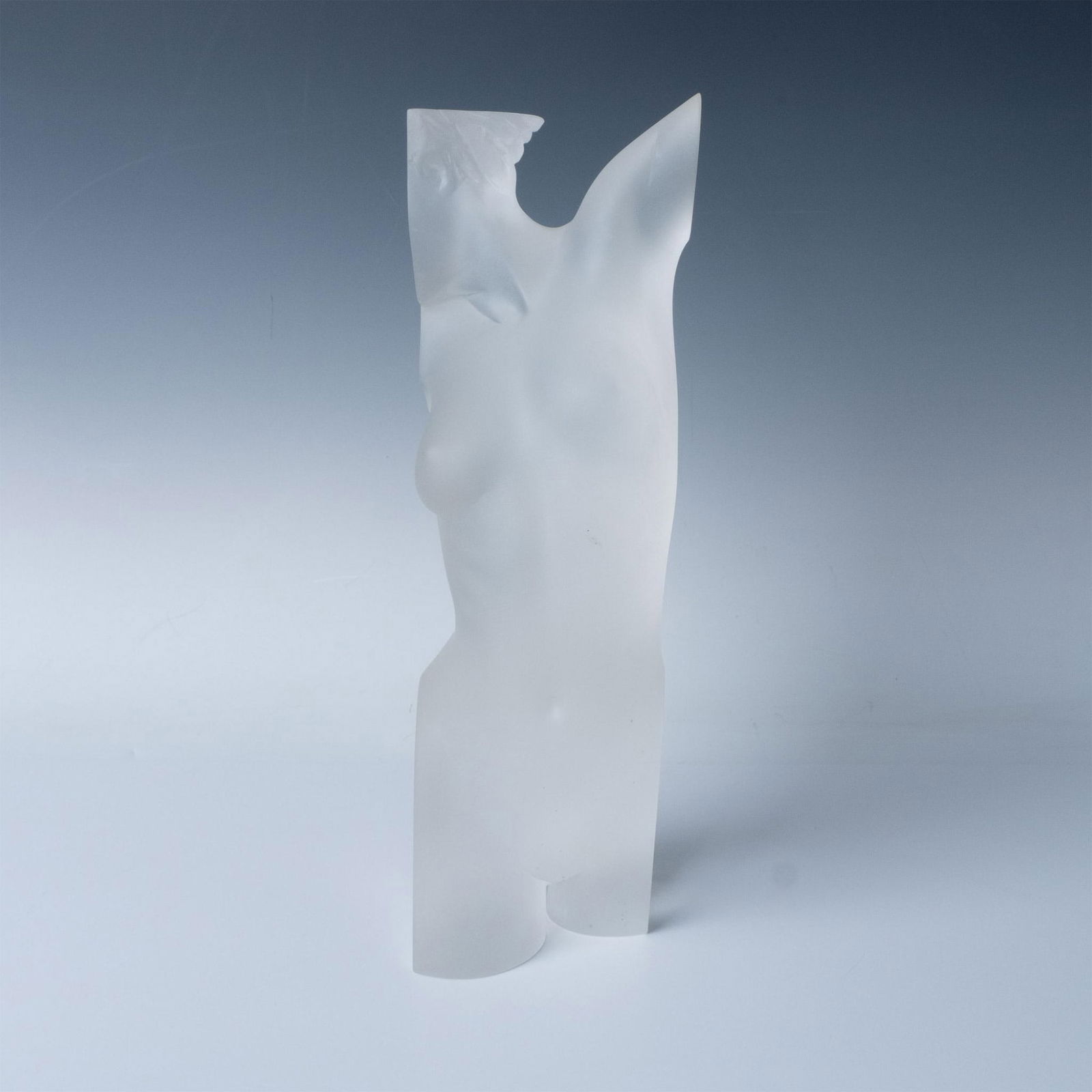 Frank Gallo (American, 1933-2019) Glass Sculpture, Galatea: Limited edition. A nude female figure in frosted cut glass. Artist singed and numbered. Weight: 11.8 lbs. Artist: Frank Gallo Dimensions: 4"L x 4"W x 12.25"H Edition Number: 53 of 100
