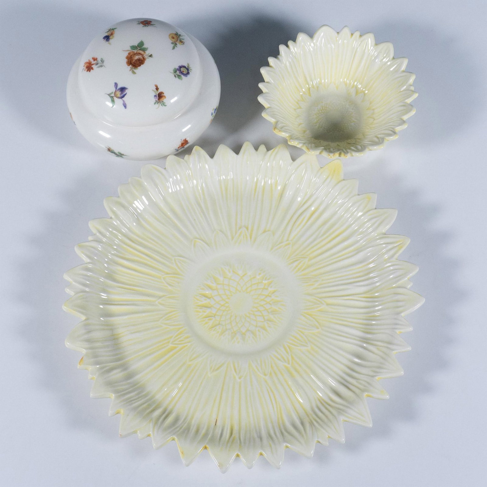 3pc Vintage P.S. Pottery Floral Home Decor: Includes a hand painted sunflower chip tray with matching bowl. Also, includes a white round covered box adorned with wildflowers. P.S. marked on the underside. Tray: 1"H x 10.5" dia. Bowl: 1.75"H x 5