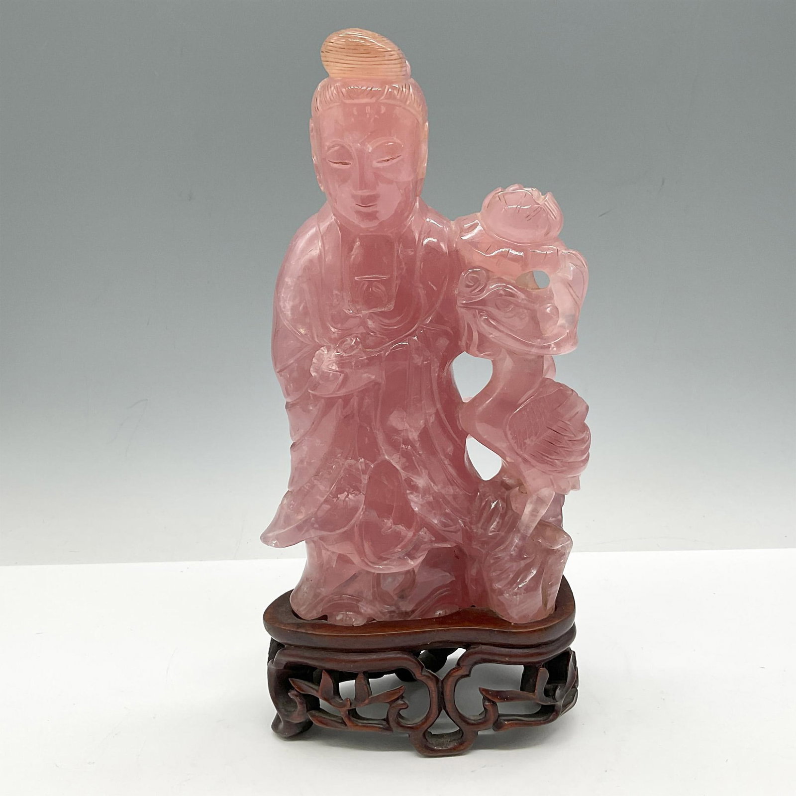 Guanyin Rose Quartz Sculpture: This Goddess of Mercy is all seeing and all hearing and embodies compassion. It is said to have this figure nearby is to bring protection. Sculpture is designed with bird and flower nearby. Statue is 