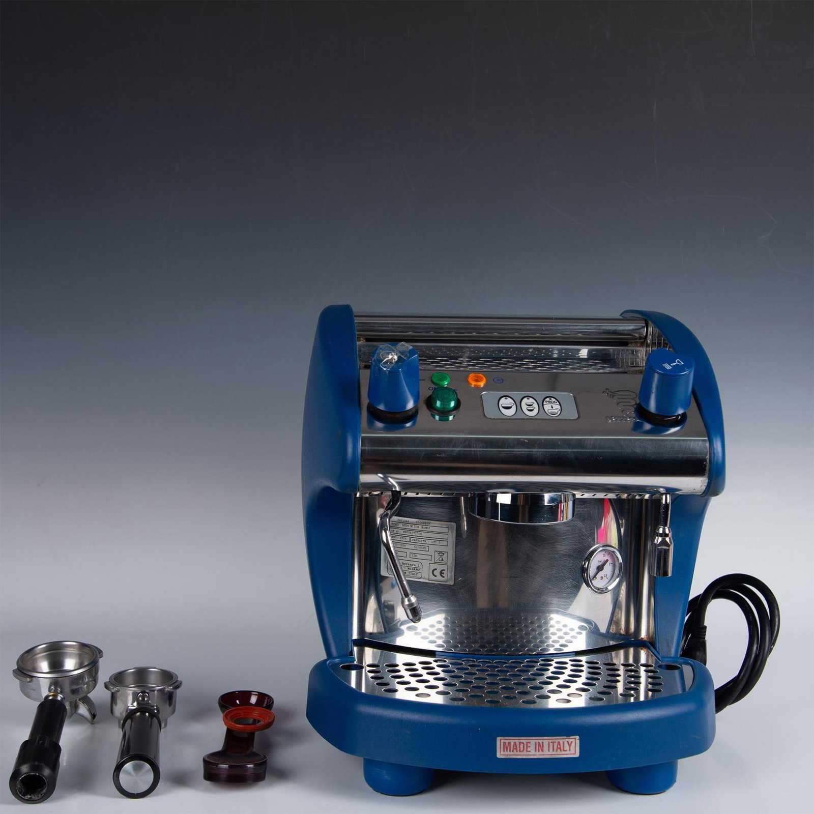Bezzera Commercial Espresso Machine: Blue plastic case with stainless steel tray and mechanism. Push button controls, pressure gauge, steamer and water controls on front. Accessories included. Mod. BZ02S PM. Bezzera raised mark. Issued: 