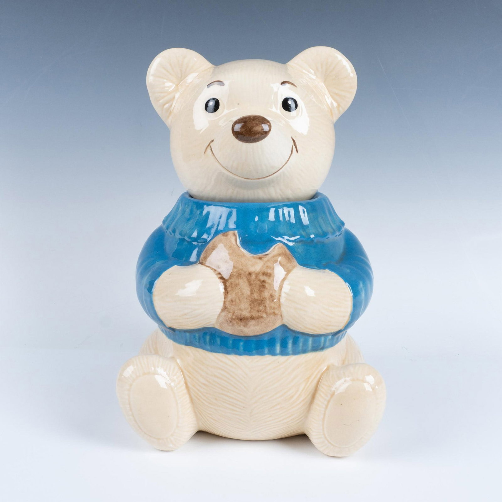 Metlox Ceramic Teddy Bear Cookie Jar: Adorable cookie jar shaped like a teddy bear with Metlox backstamp on the bottom. Dimensions: 7"L x 7"W x 11.25"H Country of Origin: United States