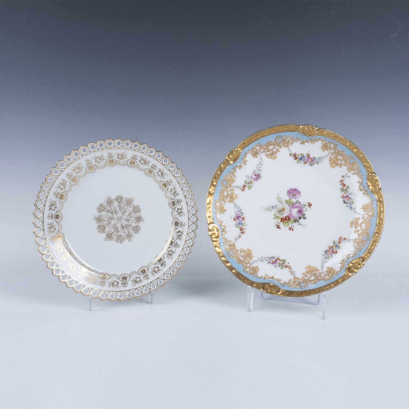 2pc Abram French Co. and Limoges French Floral Gilt Plates: Collection includes Abram French Co. American white porcelain plate with a pierced rim and gilt floral trim and center. Also includes Limoges French hand painted polychrome flowers and gilt painted ri