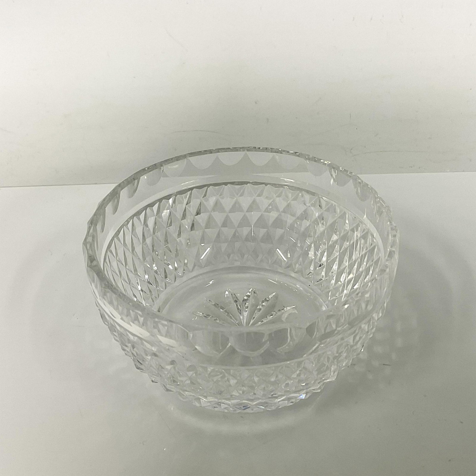 Waterford Crystal Sugar Bowl: Stunning sugar bowl, meticulously crafted from high-quality crystal, renowned for its clarity and brilliance. Waterford acid mark. Dimensions: 4"W x 2.25"H Manufacturer: Waterford Country of Origin: I