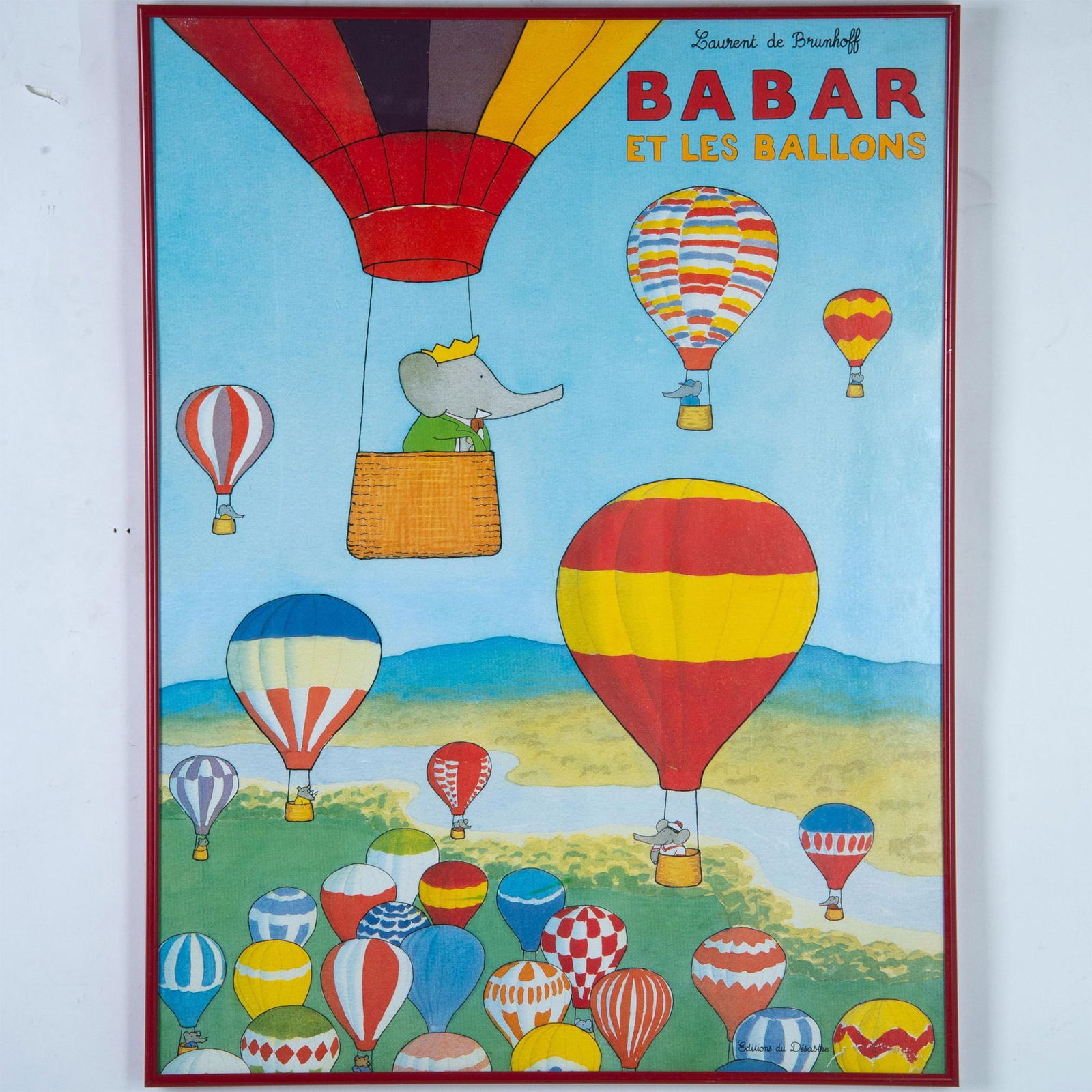 Jean de Brunhoff, Framed Poster Babar & The Balloons: Large colorful poster entitled Babar et Les Ballons by Jean de Brunhoff who depicts the iconic and beloved cartoon character Babar the elephant floating in a hot air balloon. On lower right: Editions