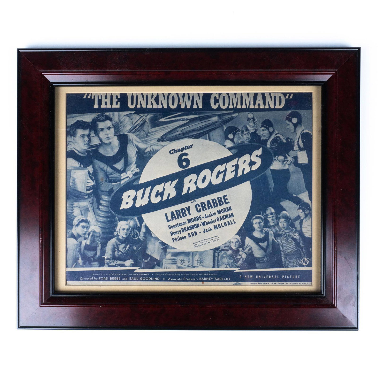 Buck Rogers Lobby Card, Framed: A card with artwork for the film Buck Rogers given to movie goers of the film. Marked Universal Pictures Company Inc. Marked 1938. Artwork can be unframed and rolled for shipment. Dimensions: 17.25"L 