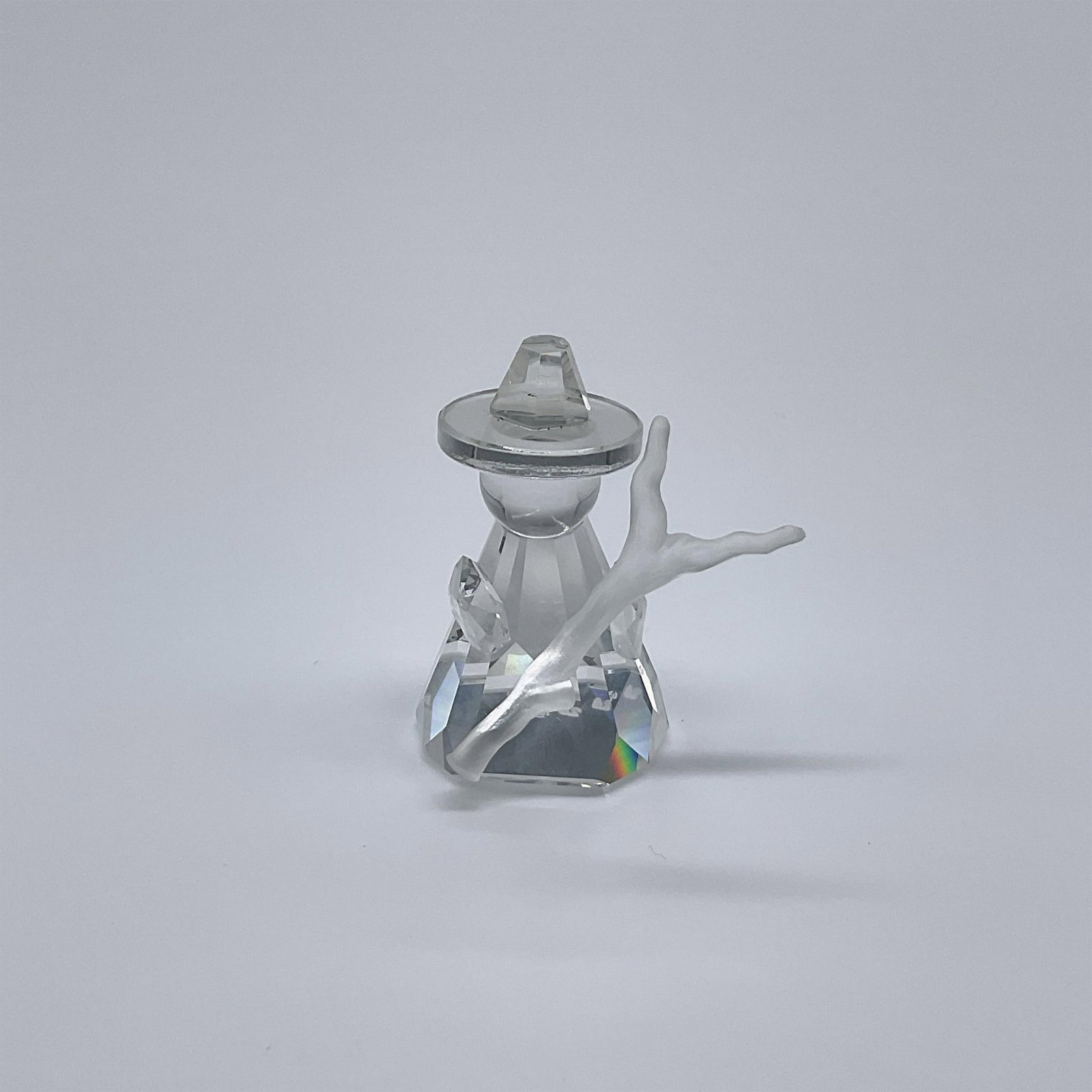 Swarovski Crystal Figurine, Nativity Shepherd: Part of the Nativity Scene collection. A clear crystal figure of a shepherd with a frosted crystal crook. Swarovski swan mark. This item has its original box: 3.25"W x 4"H. Issued: 1992 - 1993 Dimensi