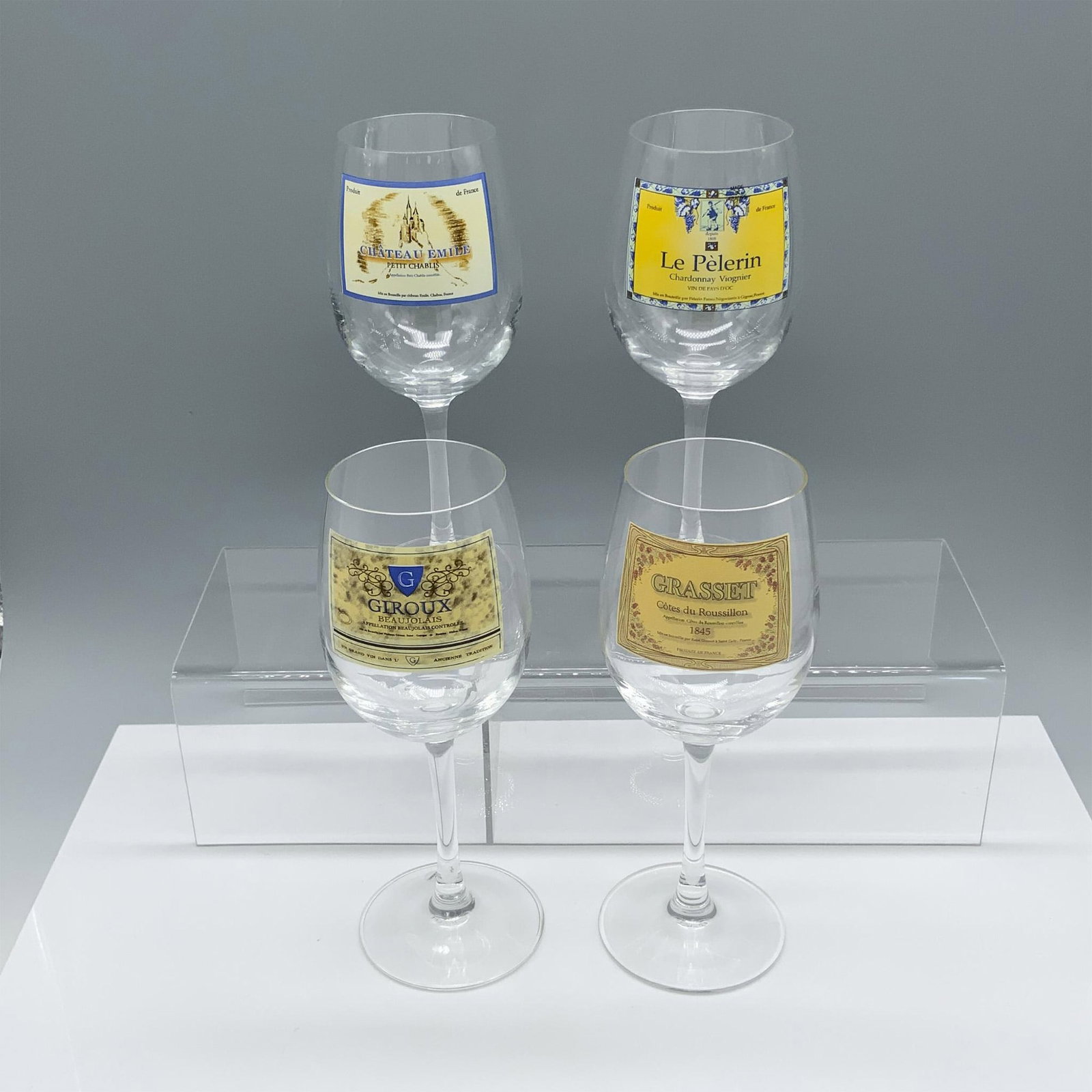 4pc French Winery Inspired Wine Glasses: Lovely collection of long stemmed glassware decorated with labels from different types of vineyards. Made in France and Arc backstamp. Dimensions: 3"L x 8"H Manufacturer: Arc Country of Origin: France