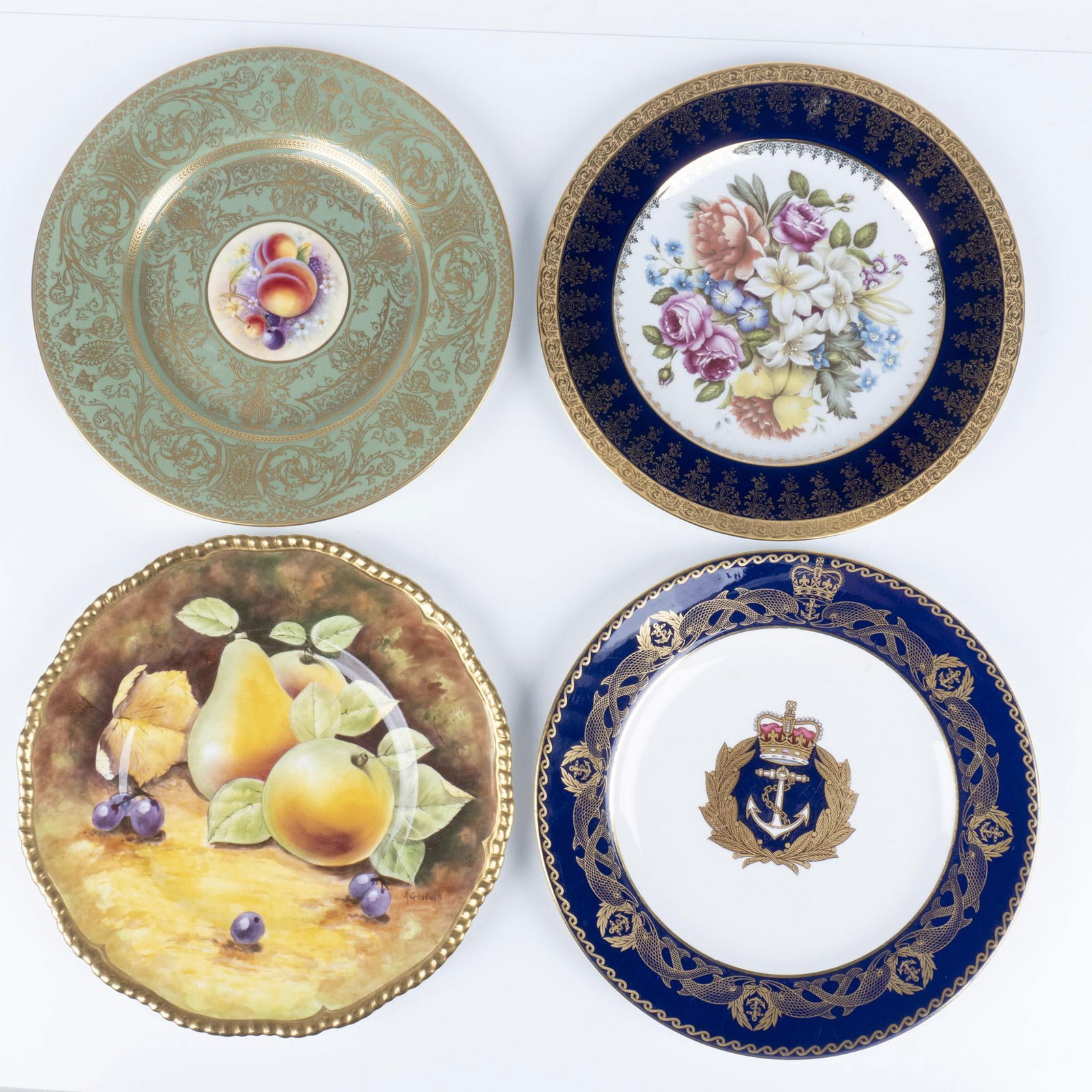 4pc European Porcelain and Bone China Gilded Plates: A collection of three English bone China decorative plates and one French porcelain plate. Each plate is adorned decorative gilded designs. Spode Royal Navy Submarine Plate limited edition 387 of 750.