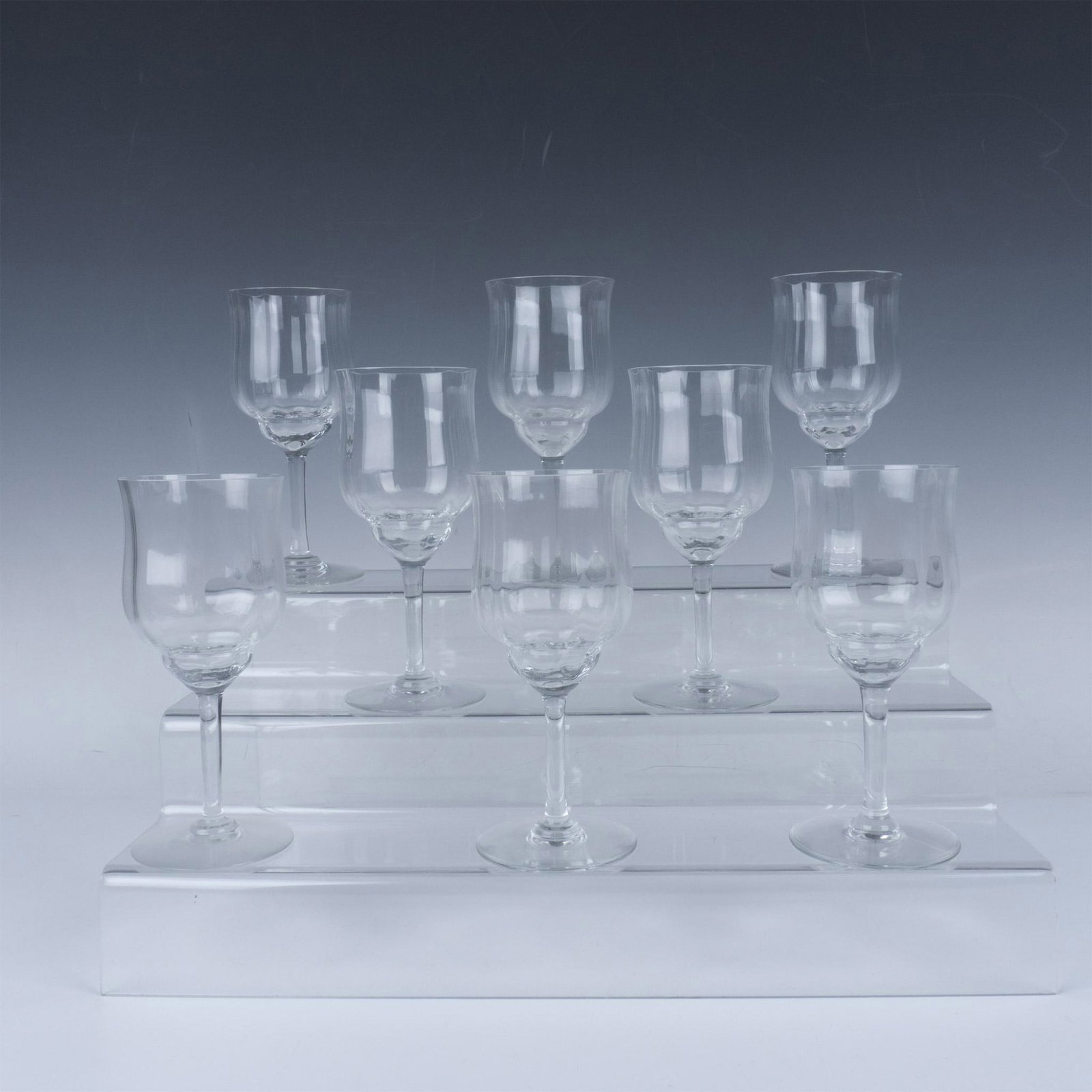 8pc Baccarat Crystal Capri Wine Stemware: Beautiful Capri pattern wine stemware set, combining elegance and functionality for an exquisite wine drinking experience. Baccarat etched marking. Dimensions: 3"W x 6.75"H Manufacturer: Baccarat Coun