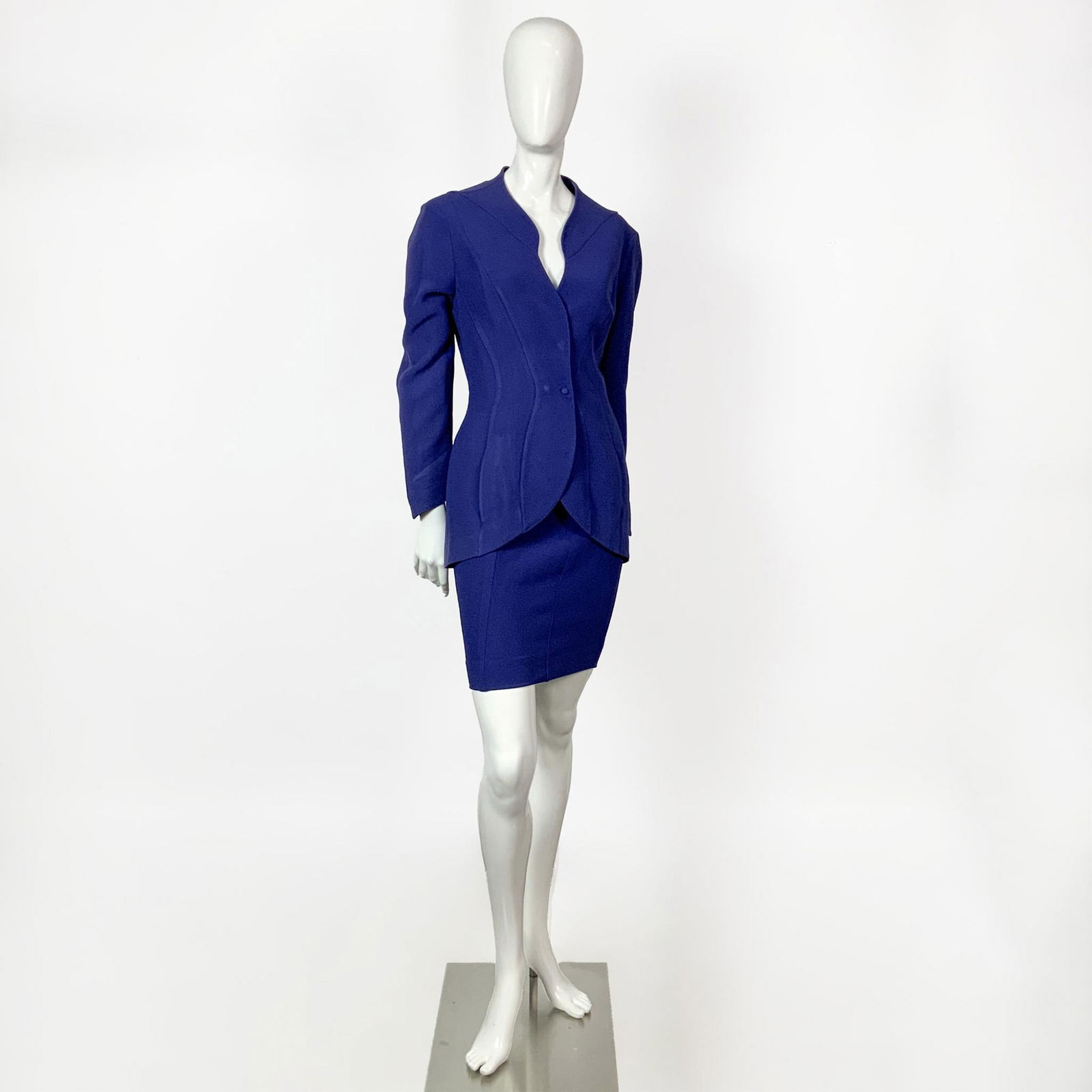 Original Thierry Mugler Paris Royal Blue Business Skirt Suit: Authentic vintage Thierry Mugler Paris royal blue skirt suit. Features a simple pencil skirt and a fitted jacket with a round collar, one faux button, and hidden hooks closure, Labels: Thierry Mugler