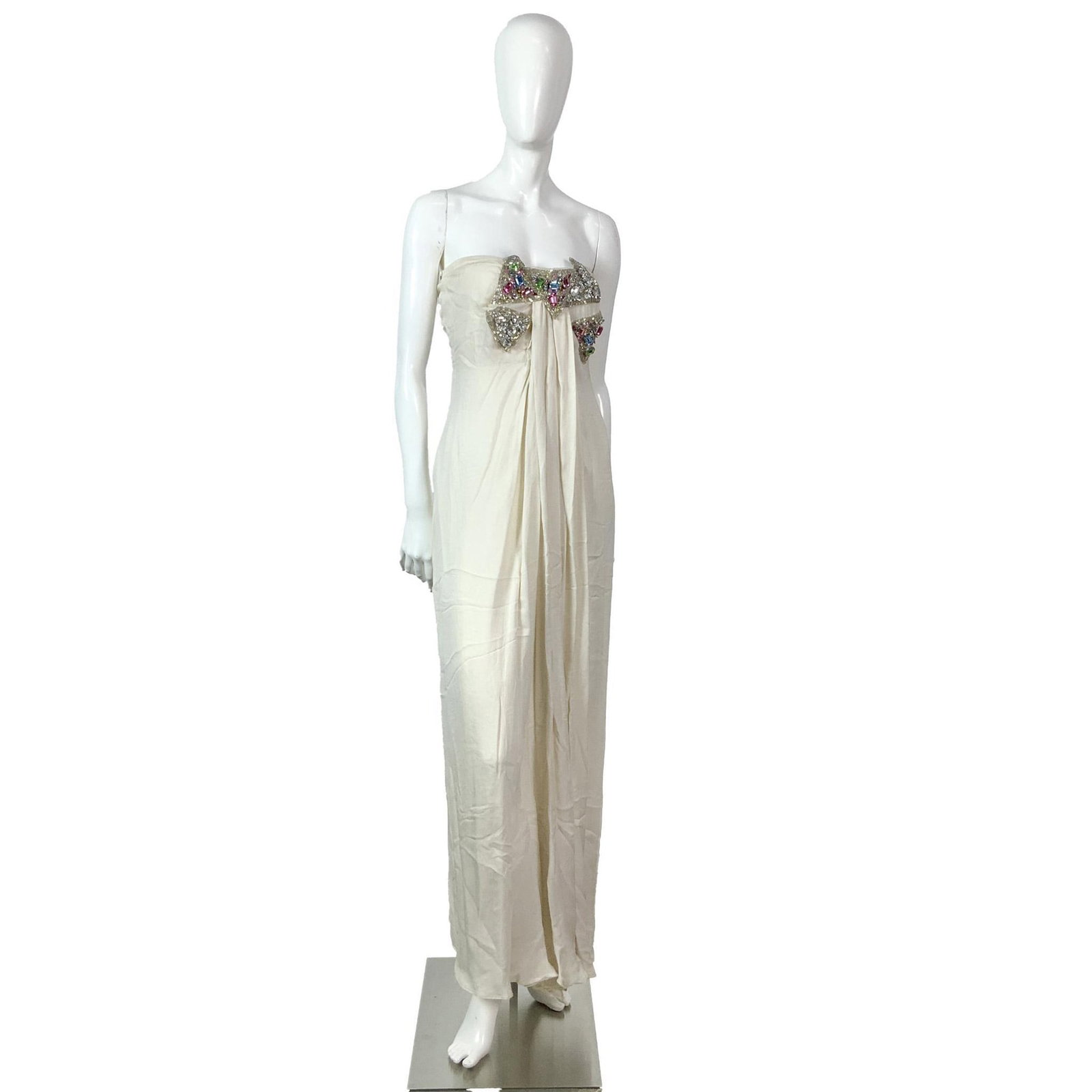 Oscar De La Renta Beaded Strapless Ivory Silk Evening Dress: Luxurious original Oscar De La Renta strapless ivory color flowing silk evening dress with splendid rhinestone and beads embroidered on the bust. Zipper on the back. Label: Oscar De La Renta. Bust: 15