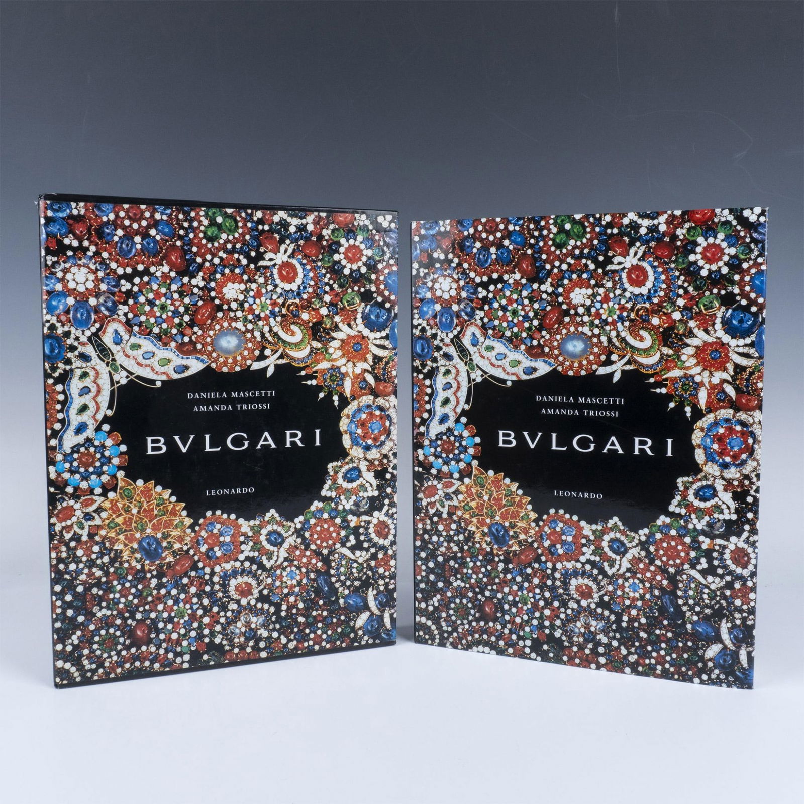 Daniela Mascetti and Amanda Triossi Book, Bvlgari: 256 page hardcover book encased in an original dustcover and box sleeve. Providing a detailed chronicle of the history of Bvlgari, celebrated designs, and enduring influence in the world of high fashi