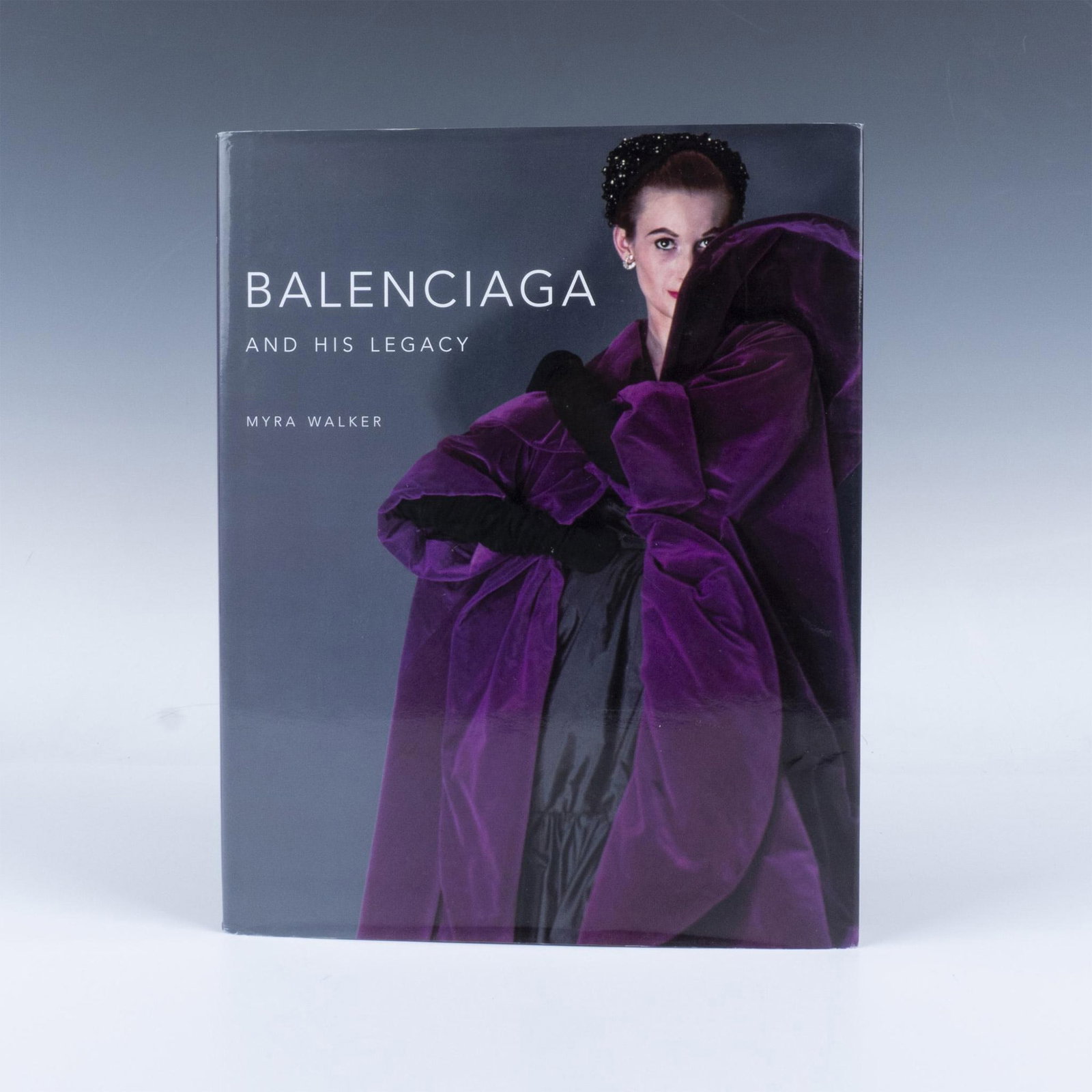 Myra Walker Book, Balenciaga and His Legacy: 162 page hardcover book with a dust cover, exploring innovative designs and their lasting impact on fashion by Balenciaga, highlighting his revolutionary contributions to haute couture, as featured in