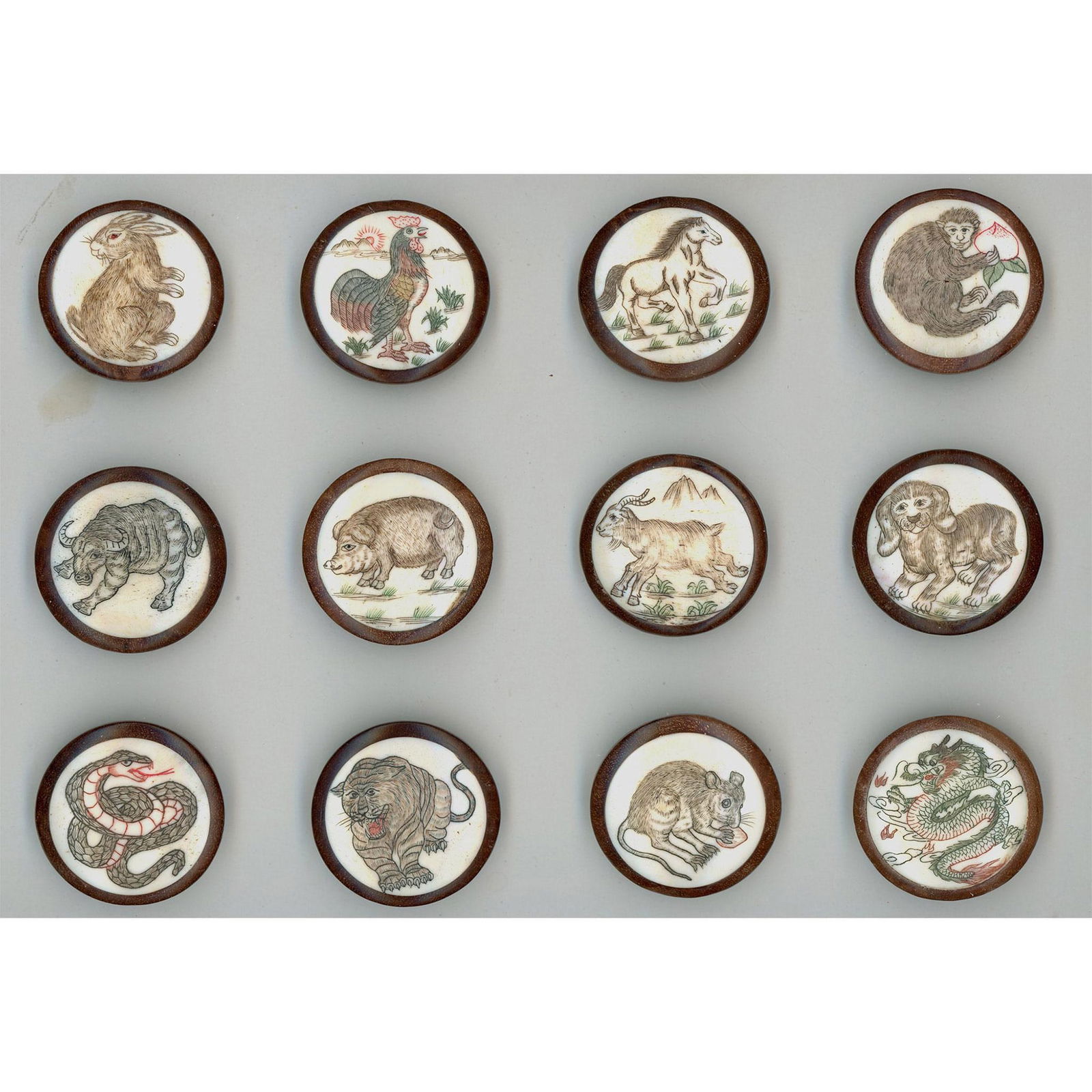 A set of Division three Chinese engraved buttons (1 of 5)