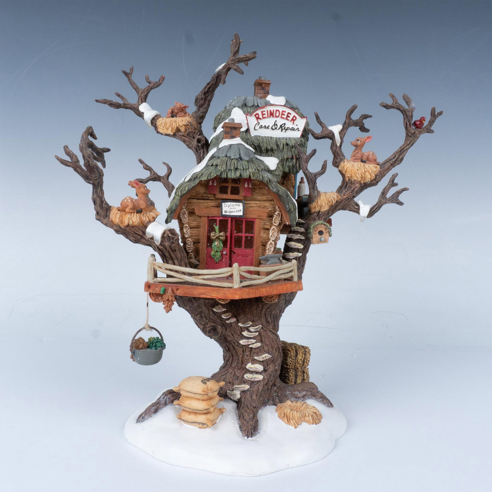 Department 56 North Pole Woods Figurine Reindeer Care/Repair: This hand painted figurine lights from the inside and comes with a single jack power adapter. Department 56 backstamp. It comes with its original box, which measures 12"L x 9"W x 13"H. Dimensions: 9.7