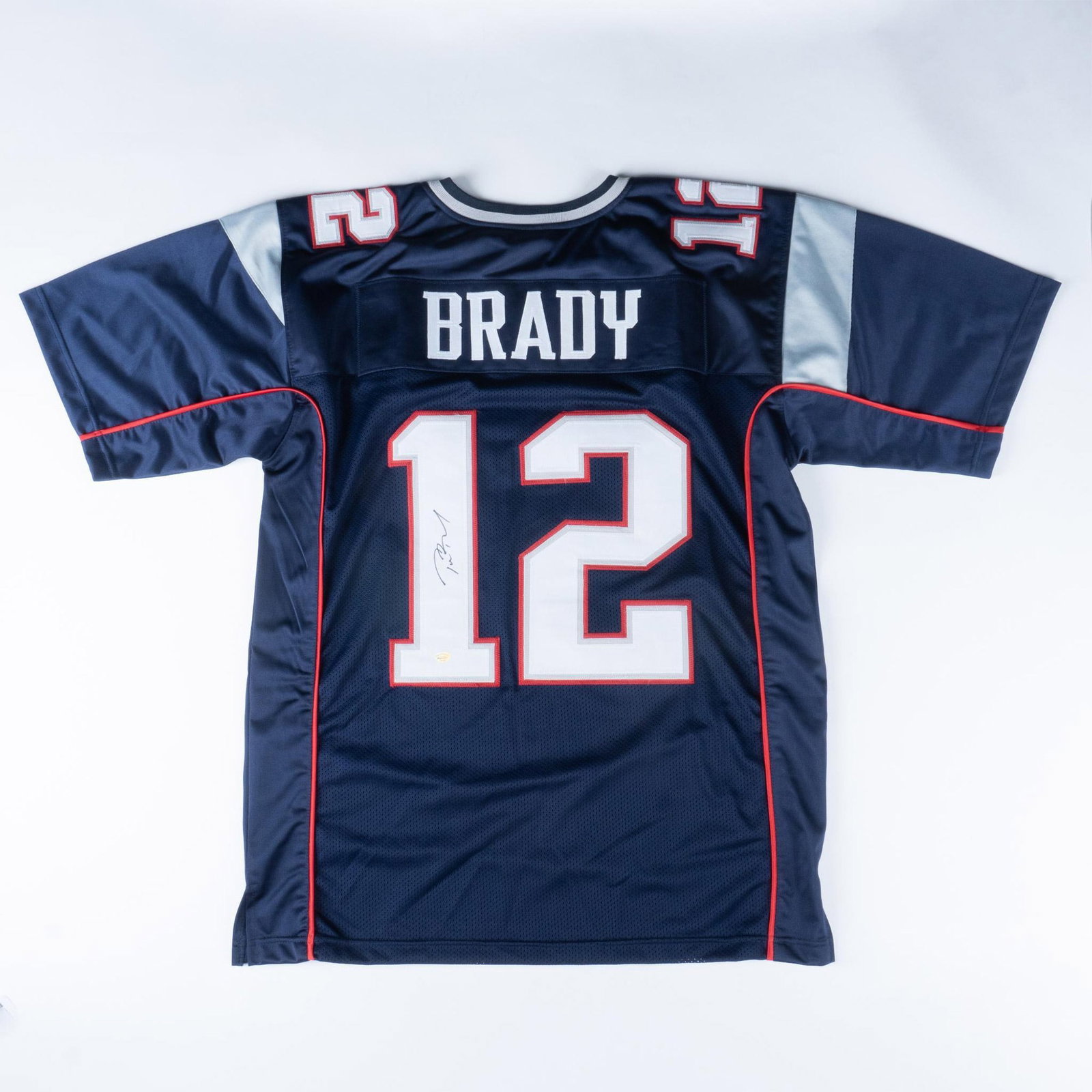 HOF Tom Brady Autographed Navy-Blue Patriots Jersey with COA (1 of 4)