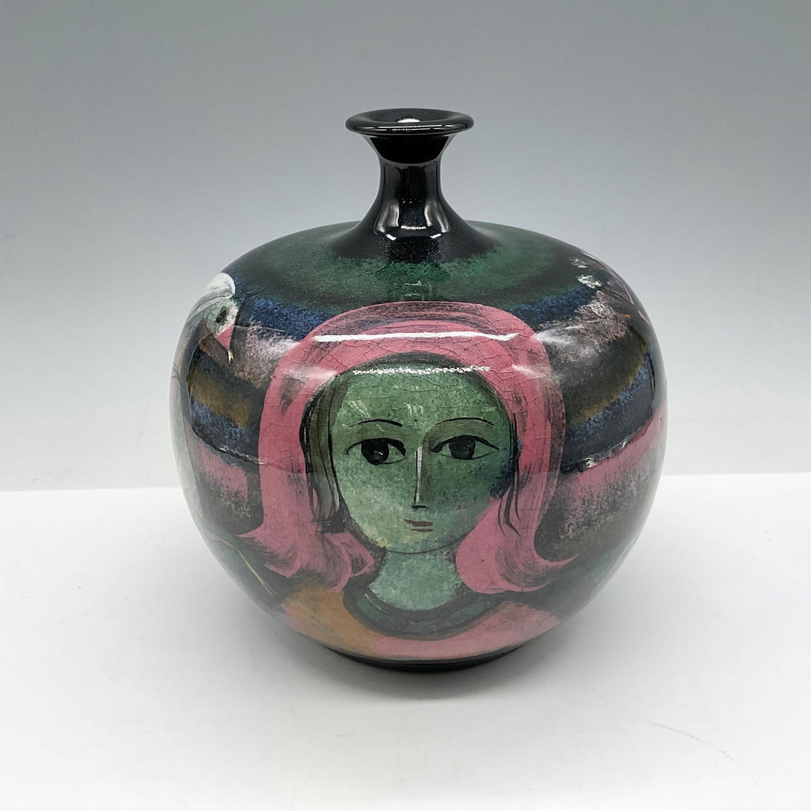 Polia Pillin (1909-1992) Women with Horses Vase: Distinctive glazed earthenware is hand designed and hand painted with figural scenes in vibrant colors over black base. Artist mark on base. Artist: Polia Pillin Issued: c. 1950 Dimensions: 6.25"H x 5