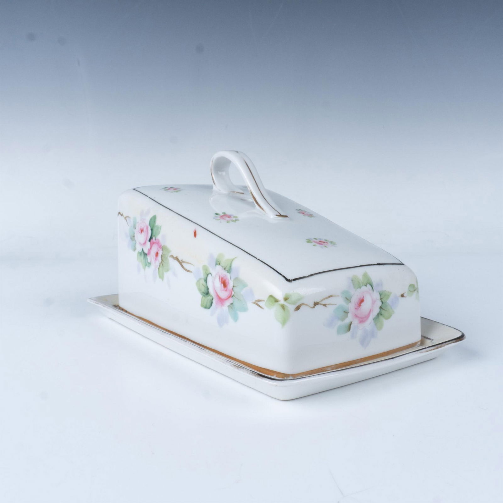 Antique Nippon Porcelain Lidded Cheese Wedge Plate: This is a gorgeous hand painted porcelain plate and lid decorated with delicate flowers and lined with gold. Maple Leaf Nippon backstamp in blue. Issued: 1891-1911 Dimensions: 7.75"L x 5.75"W x 4.25"H