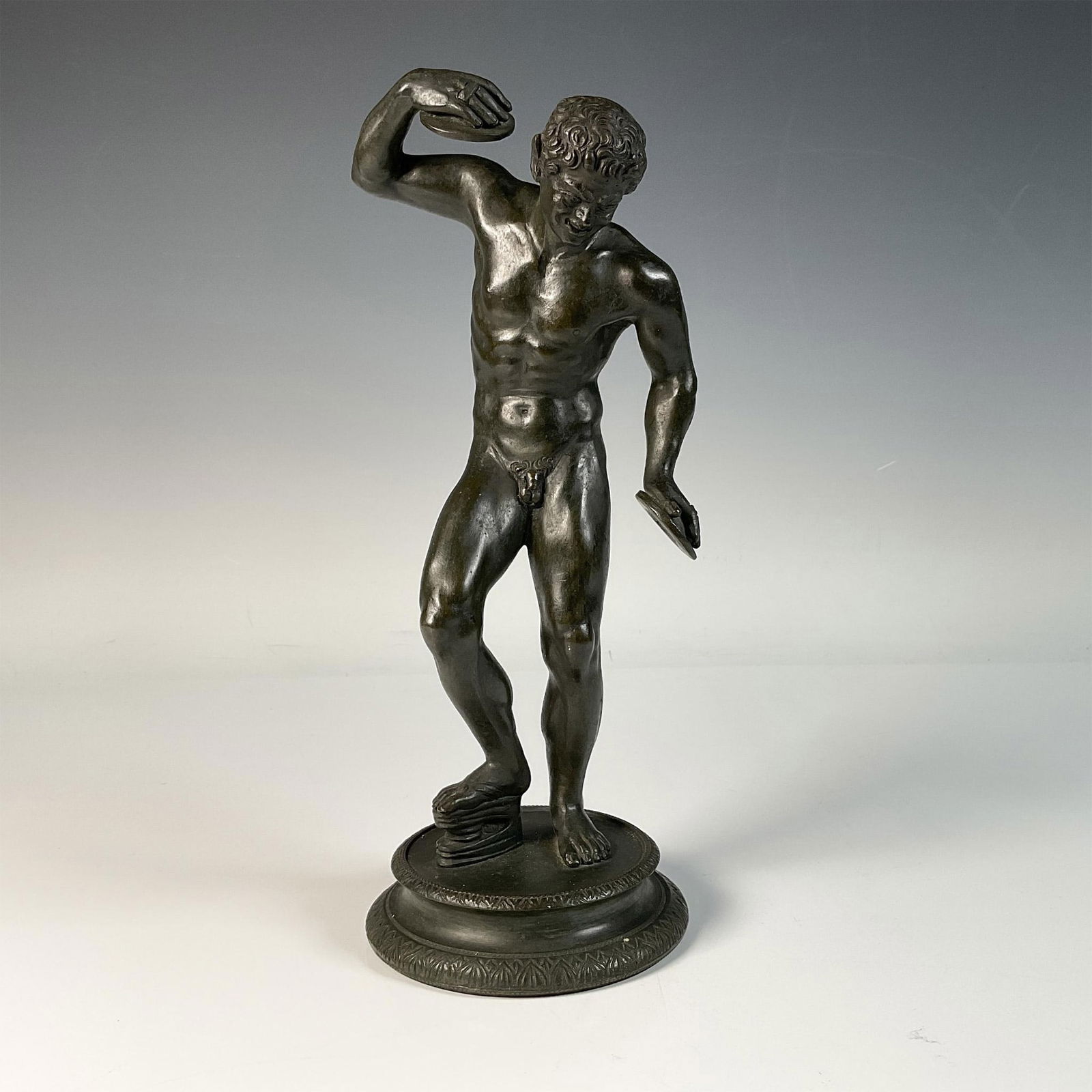 Pietro Cipriani (Aft.) Original Bronze Statue, Dancing Faun: Original bronze statue in brown patina entitled Dancing Faun after the antique by 18th century Italian sculptor Pietro Cipriani who depicts a nude with cymbals to emphasize the classical idealized hum