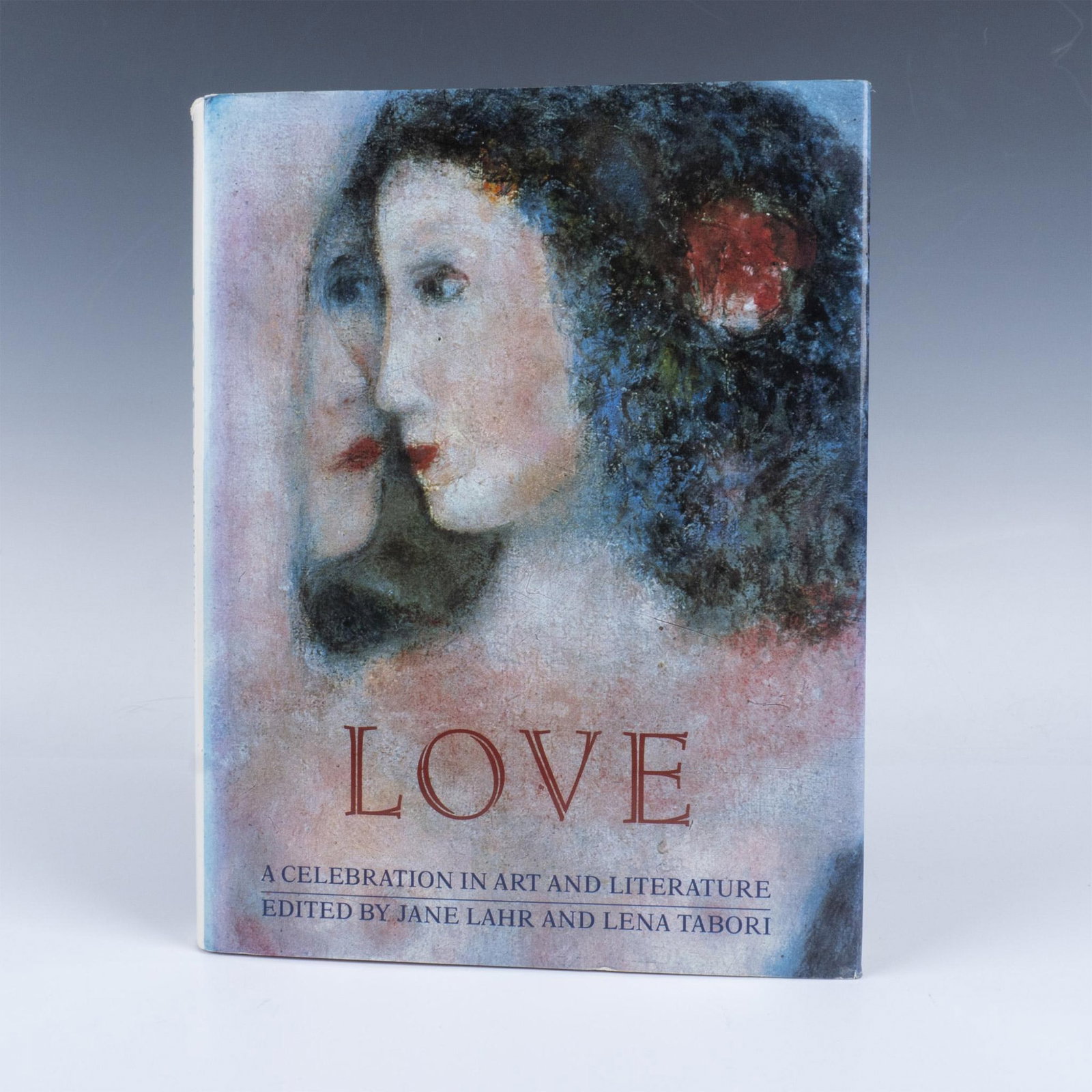 Jane Lahr Book, Love: A Celebration in Art and Literature: 239 page hardcover book with a beautiful dust cover and a letter of blessing sent to the previous owner. The book explores the theme of love through various artworks and literary pieces. It illustrate