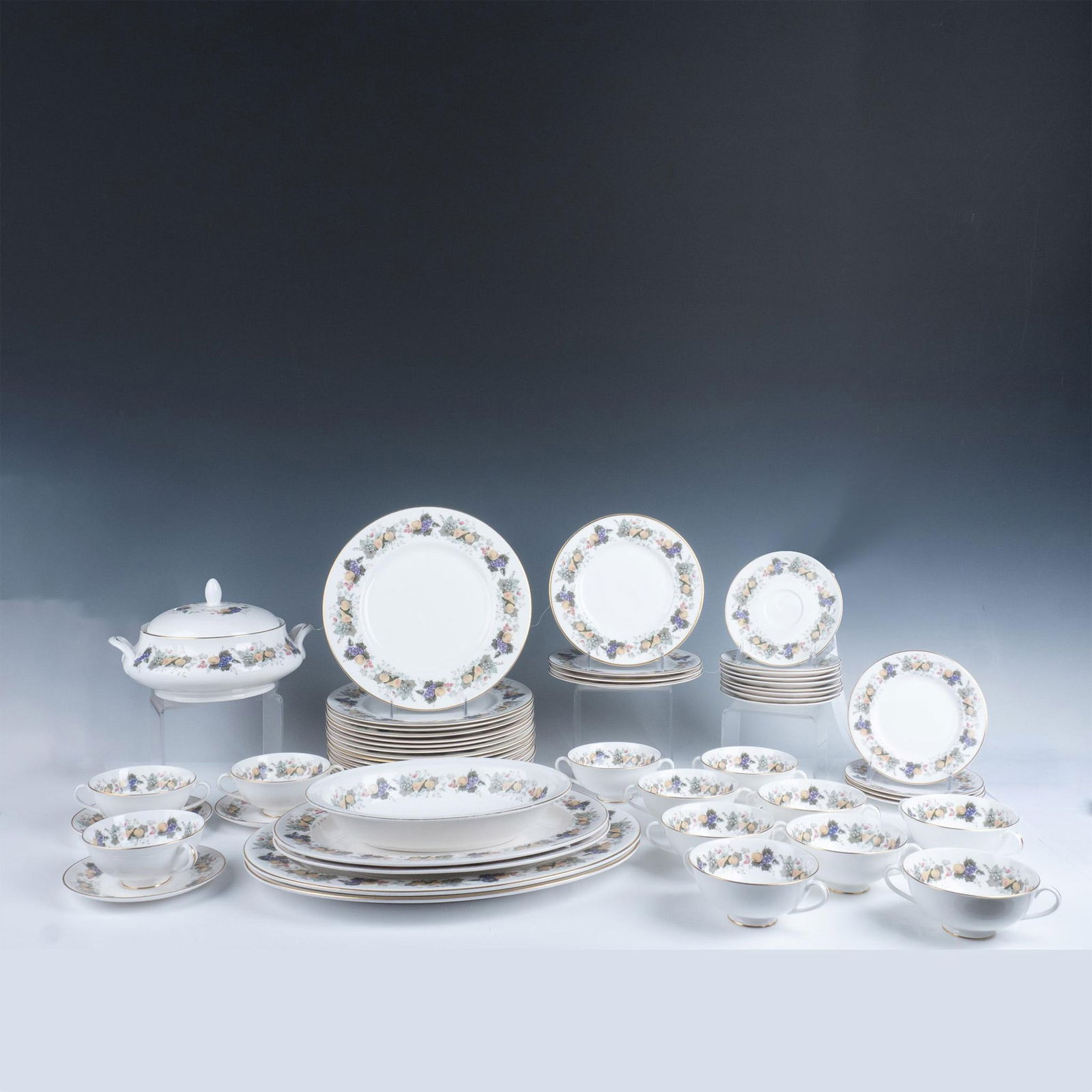 54pc Royal Doulton Bone China Dinnerware Set, Ravenna: Gorgeous 54 pieces of fine Bone China set in the Ravenna pattern. Includes: 12 double handled cream soup bowls with 12 saucers, 16 dinner plates, 4 dessert plates, 4 side plates, 2 large oval platters