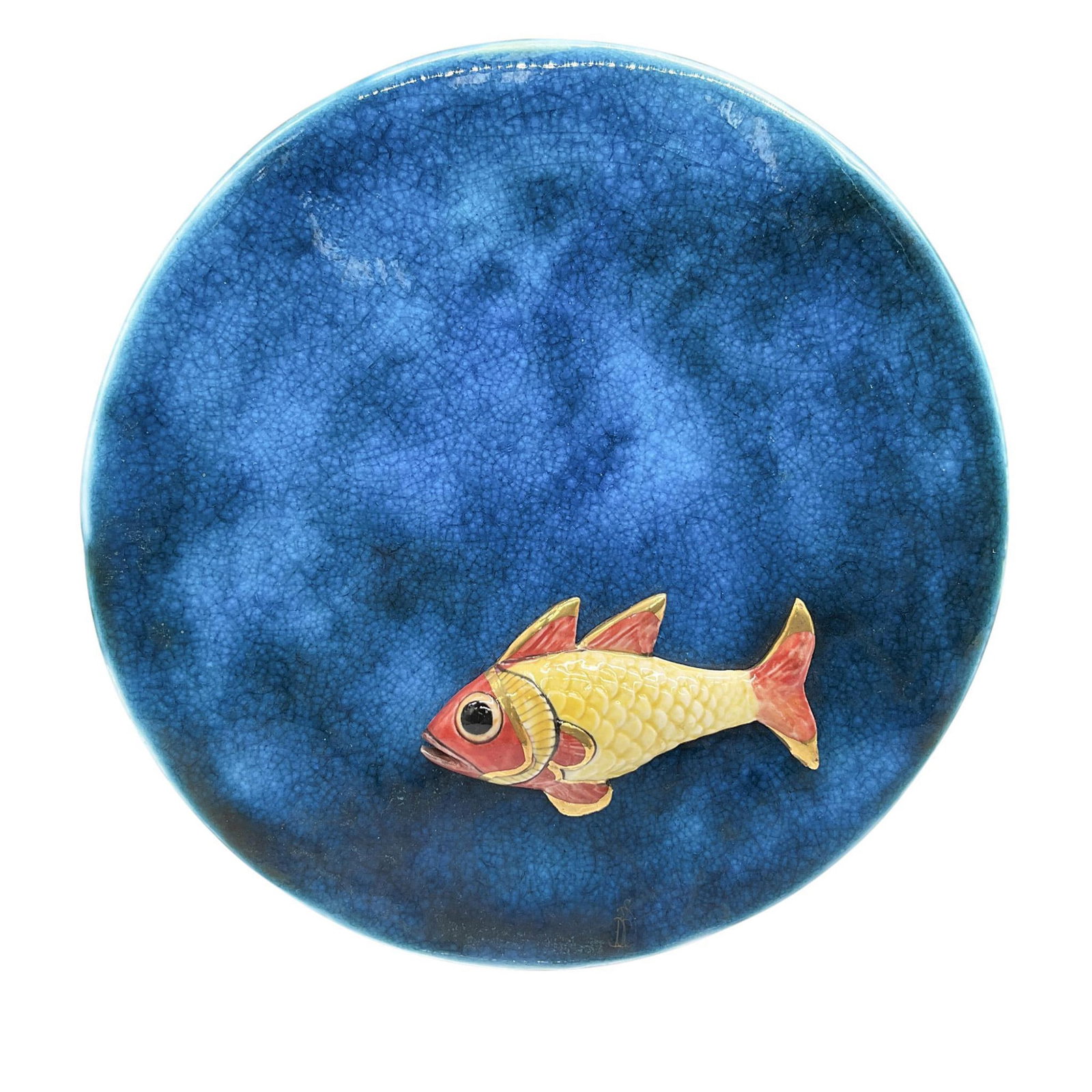 David Burnham Smith Ceramic Fish Wall Plaque: A rare, crackle blue, round hand crafted and hand decorated wall sculpture, depicting a figure of a yellow and orange fish with gilt accents. Marked DBS on the lower front. The reverse side marked DBS