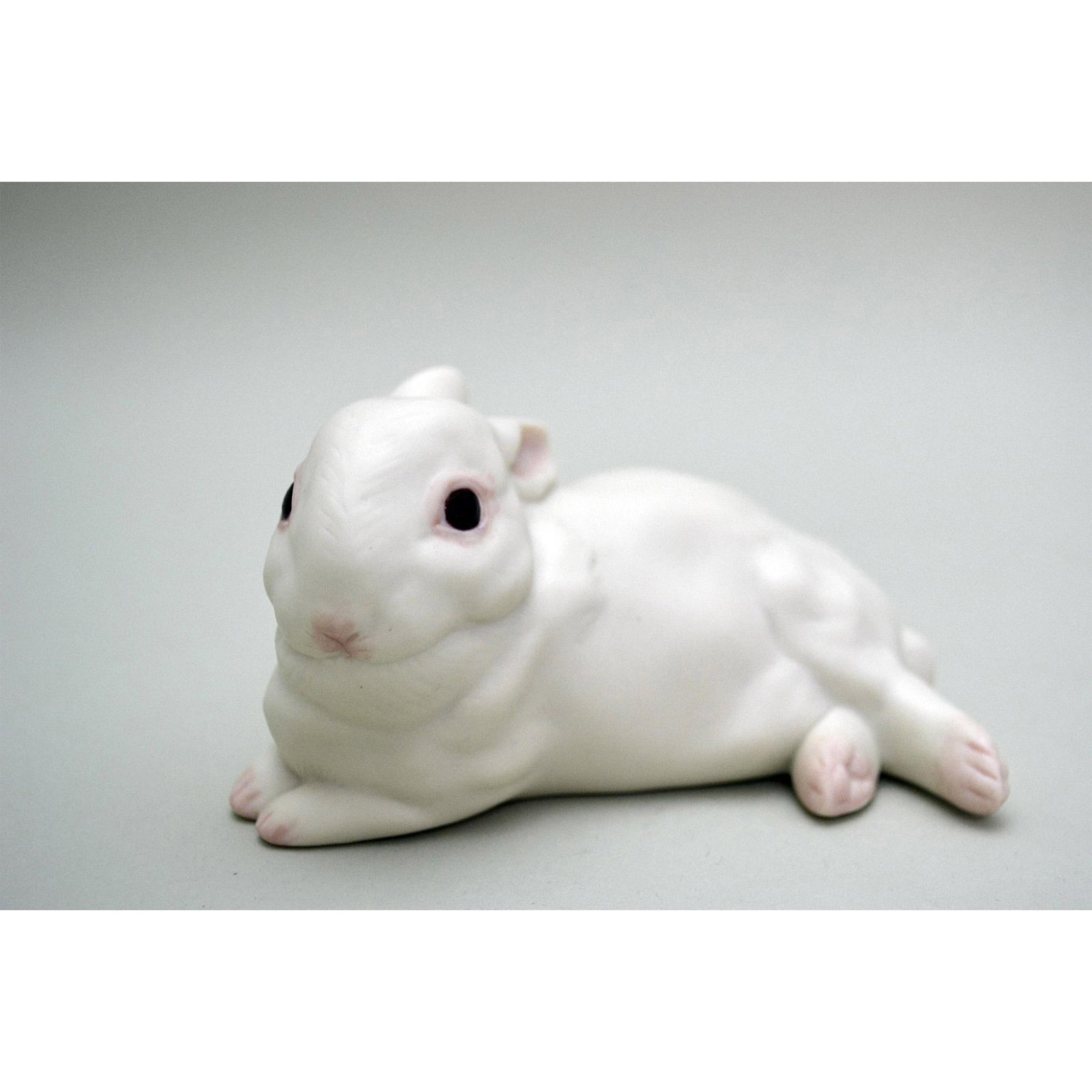 Cybis Porcelain Bunny, Jellybean, Resting Sculpture: Bisque Porcelain Decorated, hand created, hand painted by the Artist of the Cybis Studios. Featuring the Bunny, Jellybean at Rest. Issued: 1983. USA. Hallmark: Authentic Cybis Hallmark on the undersid