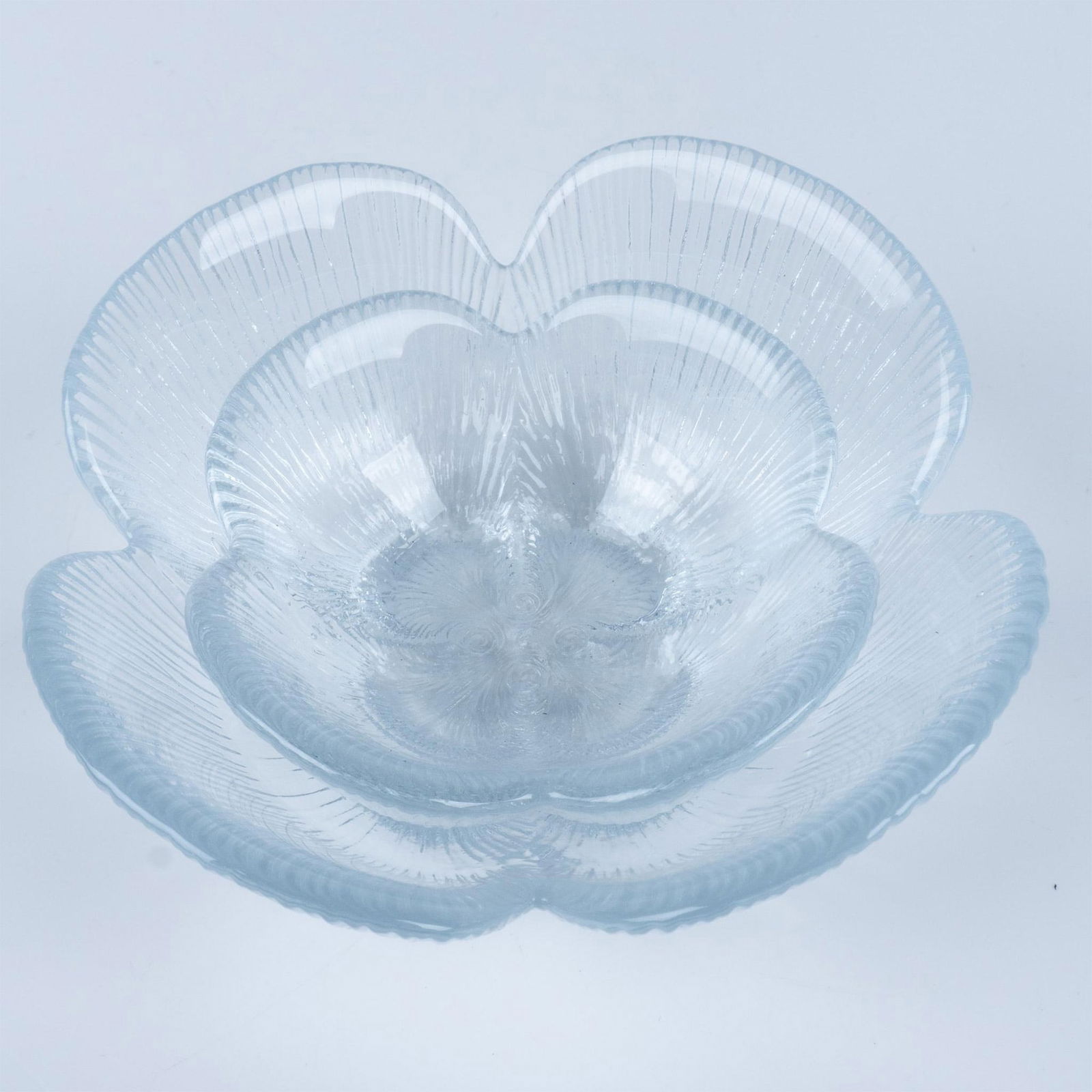 2pc Holmegaard Sidse Werner Gani-Style Glass Bowls: A set of beautifully crafted glass bowls with flower-shaped designs. Each bowl dimensions: 4.75"W x 2.75"H and 3.5"W x 1.5"H. Unmarked. Dimensions: See Description