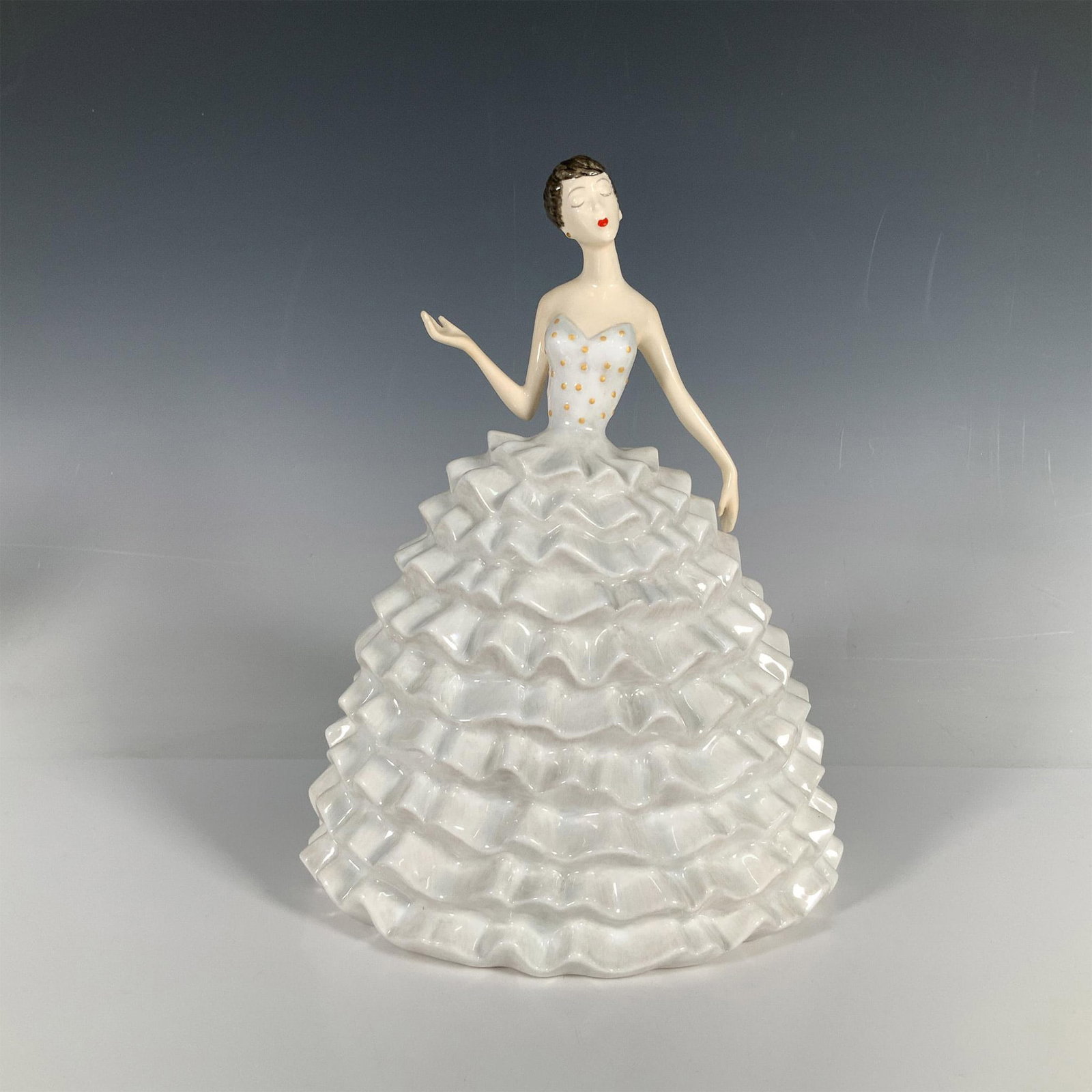 Corbeville - HN5819 - Royal Doulton Figurine: Part of the Victoria & Albert House of Worth Collection, which is based on fashion drawings by British designer Charles Frederick Worth from the 1950s, originally donated to the Victoria and Albert Mu