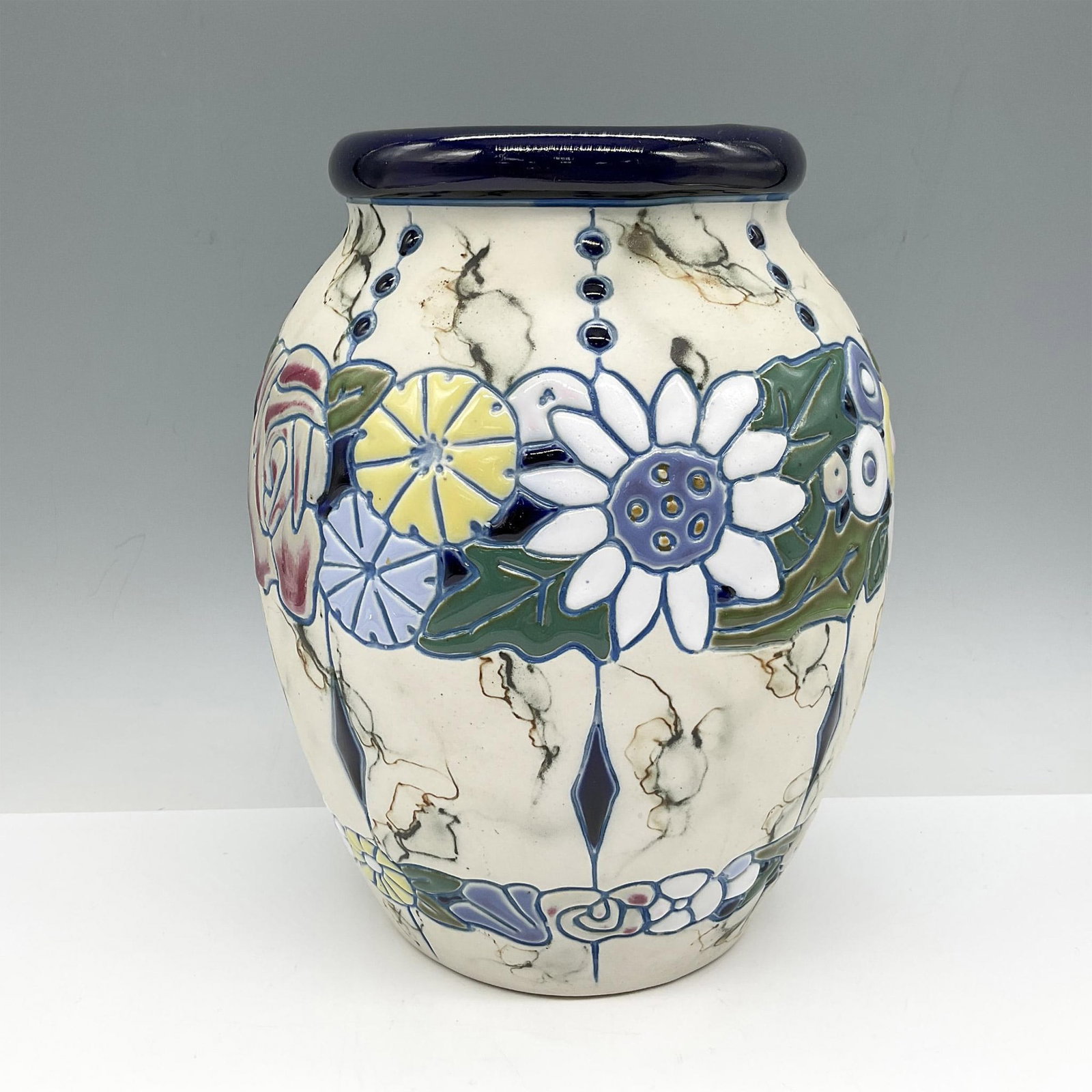 Czechoslovakian Baluster Porcelain Vase: Amphora pottery with incised floral design brightly colored in red, blue, yellow, white and green. Made in Czechoslovakia mark. Issued: 20th century Dimensions: 9"H x 6.5" dia. Country of Origin: Czec