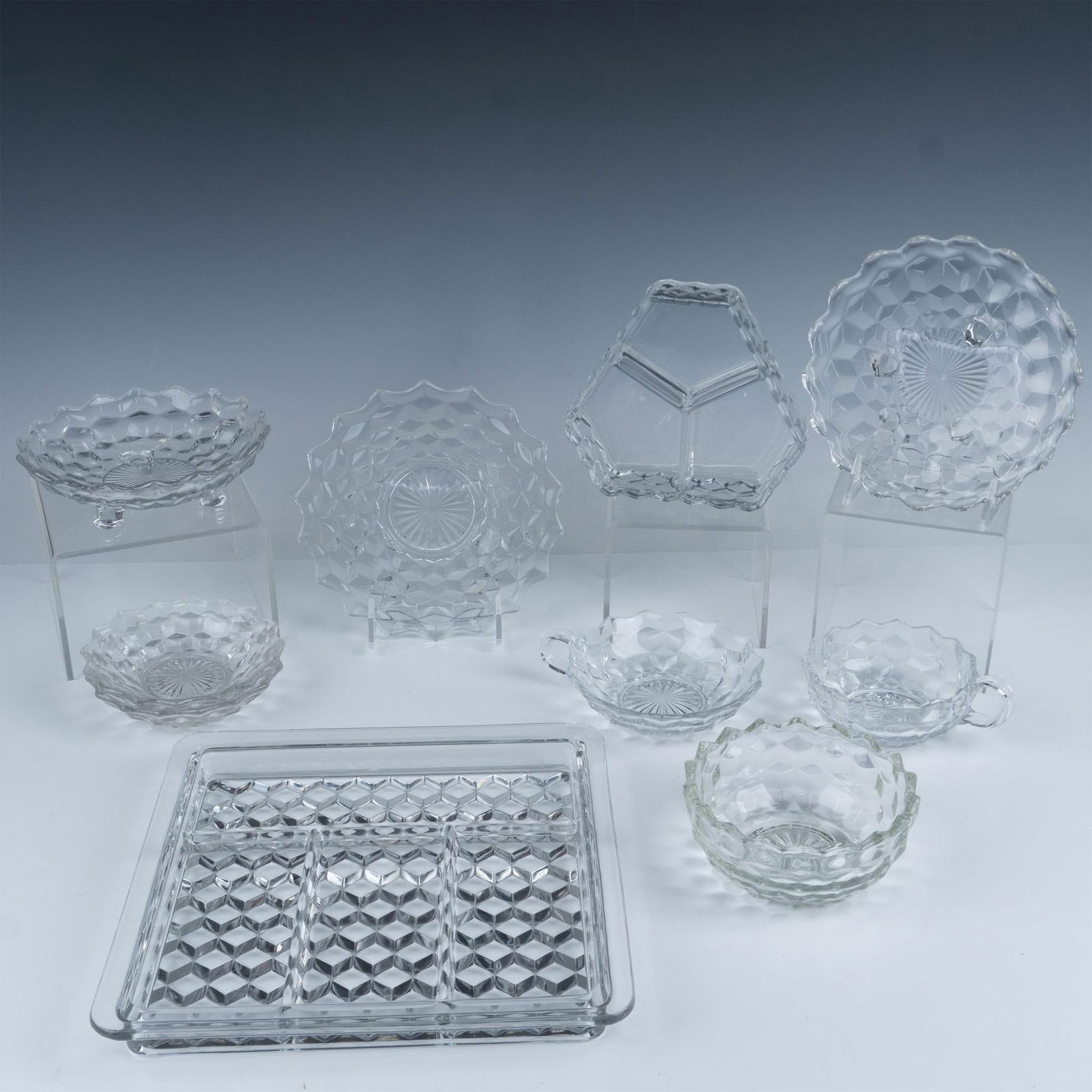 10pc Fostoria Crystal Party Serveware, American Clear: This beautiful set in the American Clear pattern includes: 1 Large four part celery/relish dip tray; 1 Three part dip tray; 2 Small fruit dishes; 1 Nappy bowl; 1 Handled nappy bowl; 1 Flared nappy bow