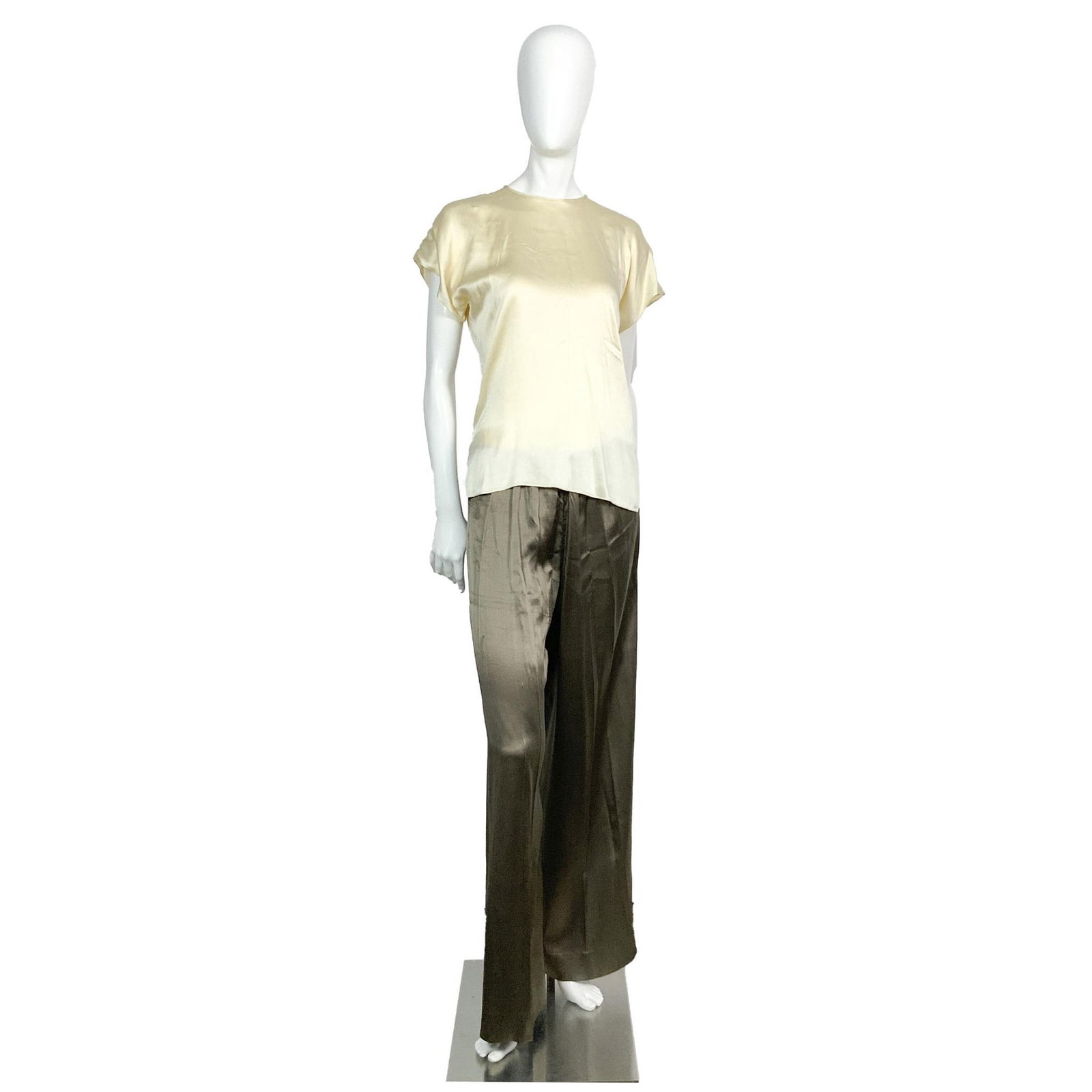 2 Pcs Cream & Brown Silk Pajama and Camisole Loungewear Set: Set of two cream and brown silk loungewear that includes one pair of pajama and a beige camisole with short sleeves. Size M. Camisole bust: 17''W. length: 23.50''L. Pants elastic waist: 14"W. Length: 