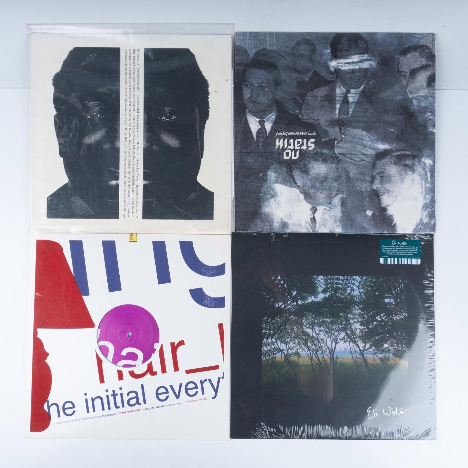 Set of 6 Avantgarde, Experimental, and Rock Vinyl Records: This diverse collection includes No Statik: Unity And Fragmentation, Fucked Up: Year Of The Rat B/W First Born, Eli Winter: LP Album, and more. The dimensions of the collection measures: 12.75"L x 1"W