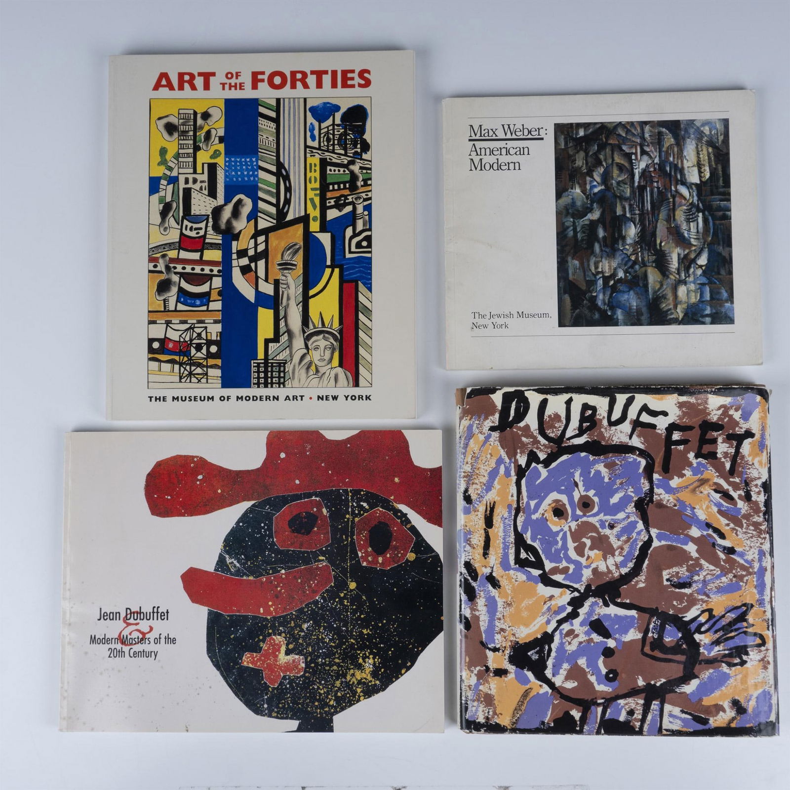 4 Modern Art Hardcover and Paperback Books: Showcasing the masters of the 20th century. Titles include: Max Weber: American Modern, by the Jewish Museum of New York; Dubuffet by the Museum of Modern Art of New York; Jean Dubuffet and Modern Mas
