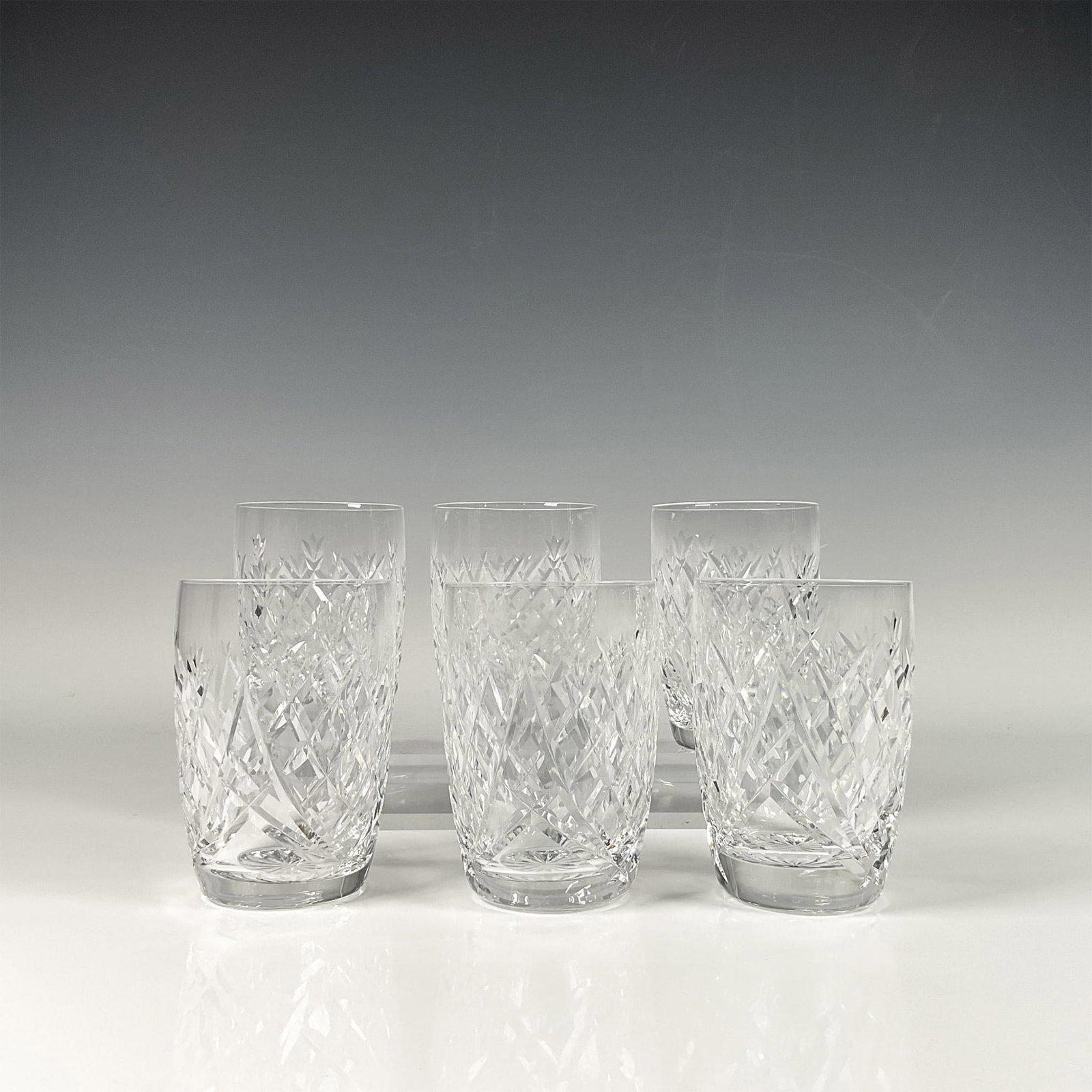 6pc Waterford Crystal Tumbler Set, Donegal: Stunning set of six Waterford crystal in the Donegal pattern, a traditional design with the intricate detailing Waterford is renowned for. Four of them have Waterford marks. Dimensions: 3"W x 4.25"H M