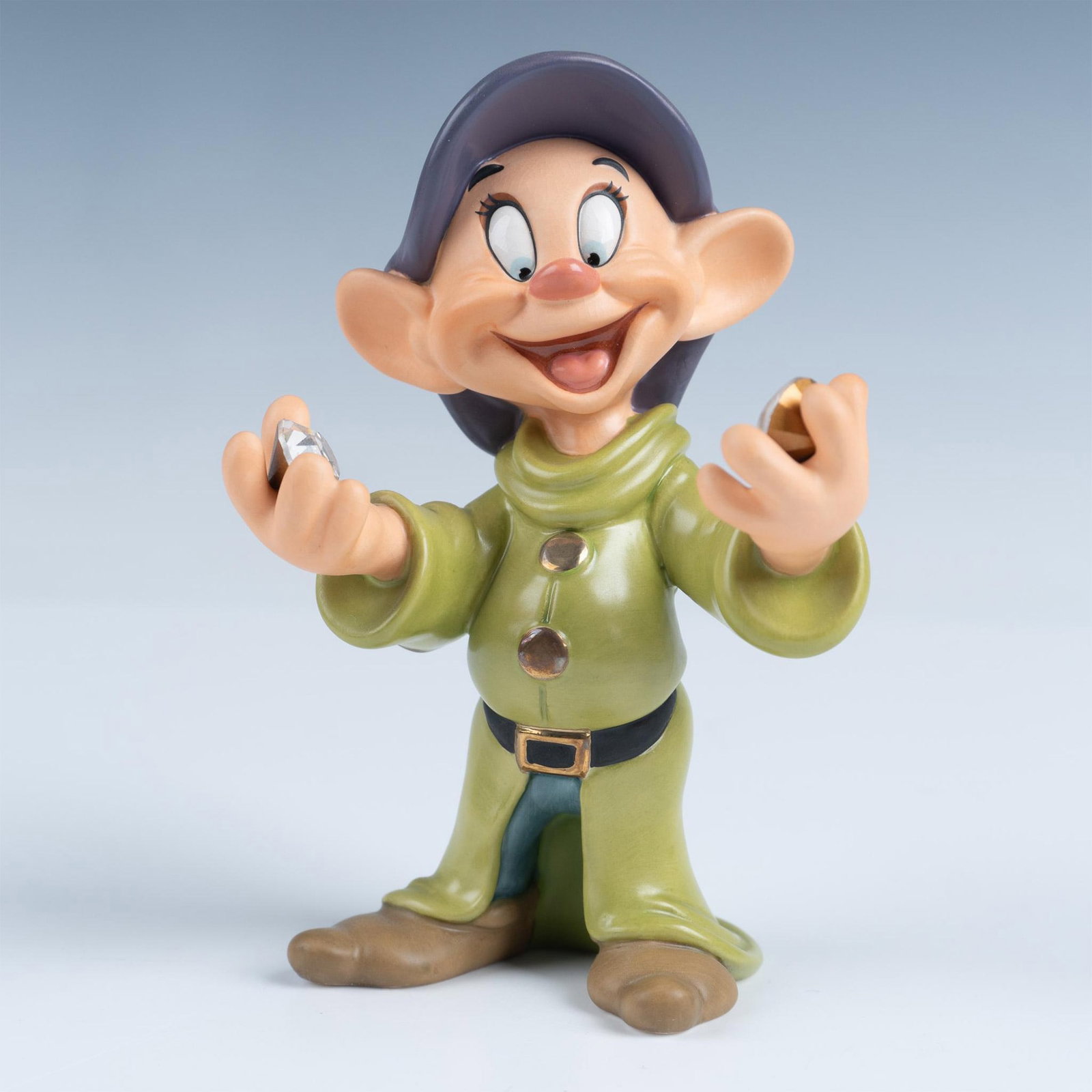 Walt Disney Classics Figurine and Pin, Bedazzled: A 65th Anniversary porcelain figurine of Dopey from Snow White and the Seven Dwarfs, complete with a commemorative pin. WDCC backstamp on the bottom. Certificate of Authenticity included. This figurin