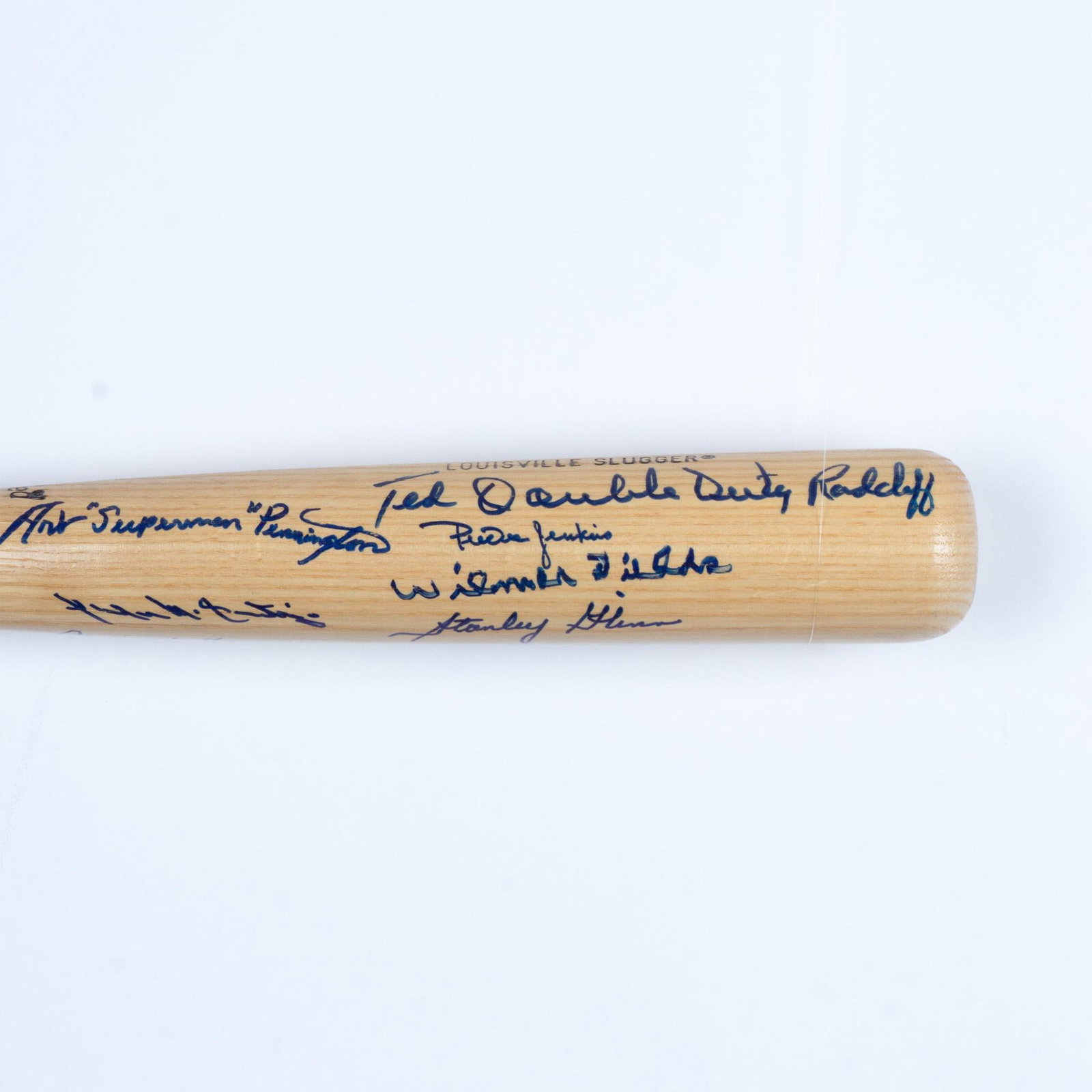 Historic Negro Leagues LS Bat Multi-Autographed: This natural wood-colored Hillerich and Bradsby Co. Louisville Slugger bat is signed by several players from the league known historically as the Negro Leagues. Notable signatures include Ted Double D