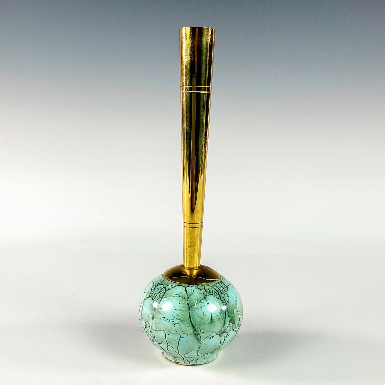 Unusual Delft Mid-Century Modern Lustre Glaze Bud Vase: Turquoise with lustre finish and branch patterning. Round body. Narrow brass spout. Hand Painted Delft Holland on bottom. This item has no reserve. Dimensions: 2.75"W x 8.5"H Manufacturer: Delft Count