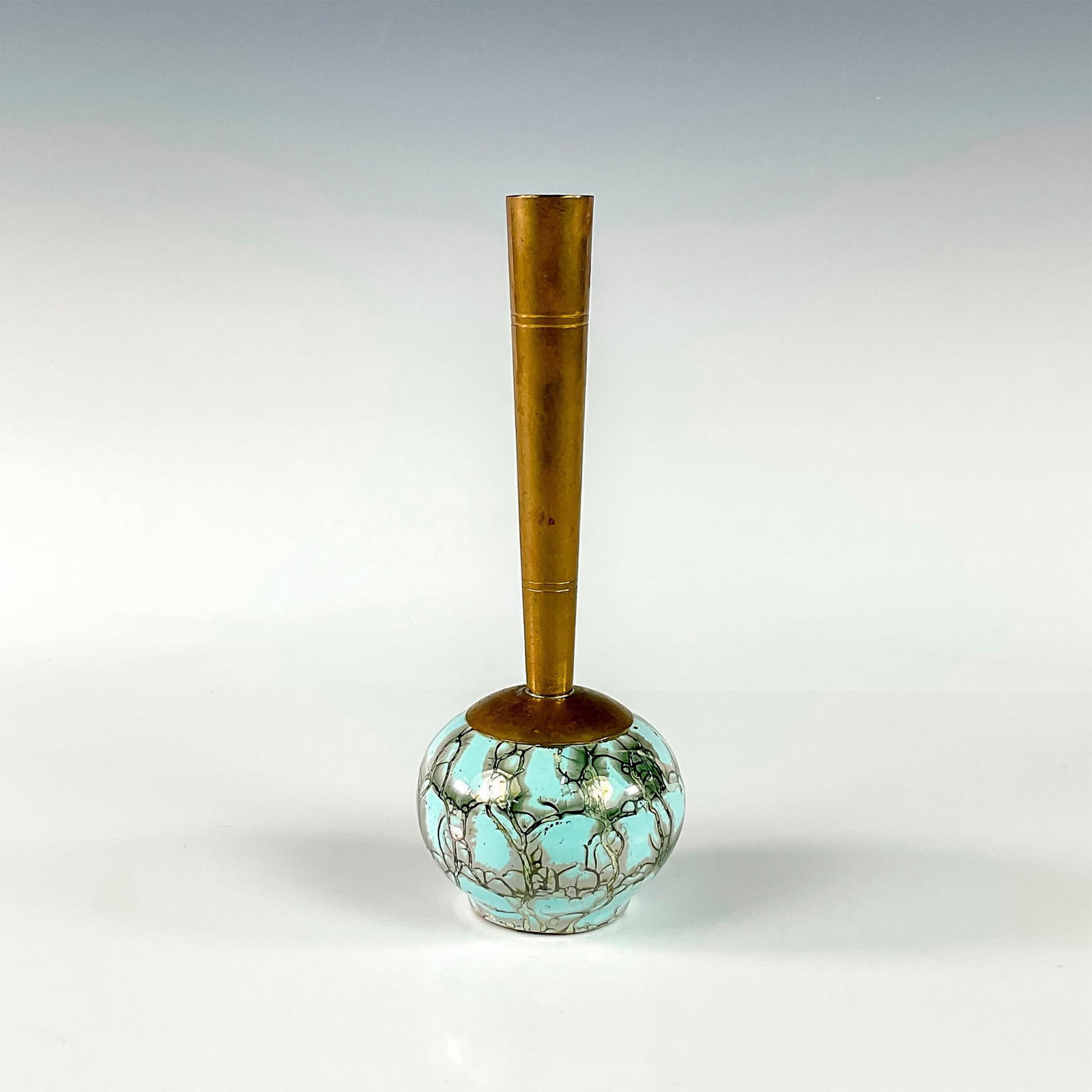 Unusual Delft Mid-Century Modern Lustre Glaze Bud Vase: Turquoise with lustre finish and branch patterning. Round body. Narrow brass spout. Gold Delft sticker on front of piece. Faded Hand Painted Delft Holland on bottom. This item has no reserve. Dimensio
