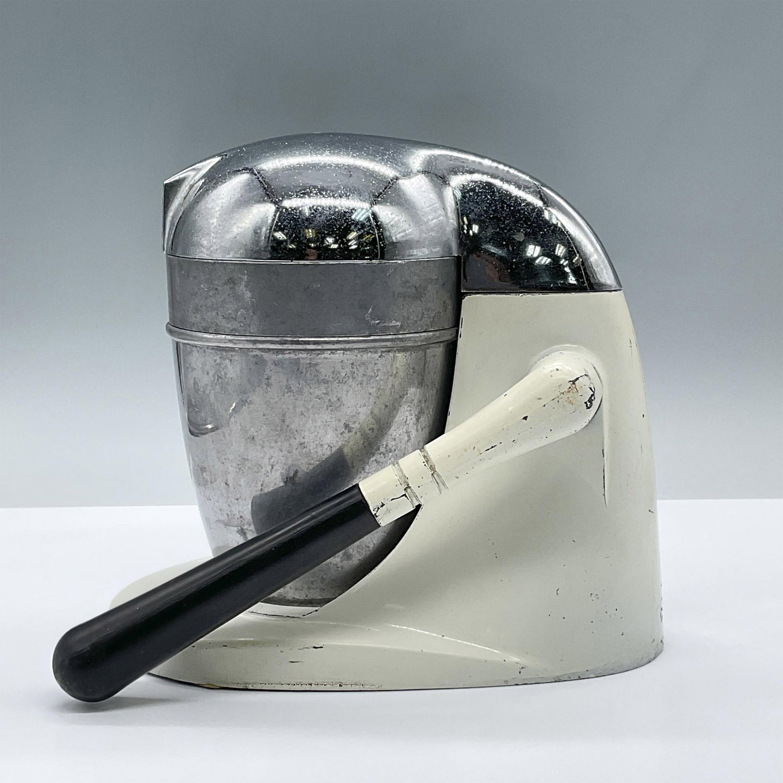 National Die Casting Juicer, Juice King: Features a lever press juicer with a chrome top, a metal removable dome and juice collector on a white metal base. Extends to 10"H. Marked National Die Casting Co., Pat No. 2131440, Model JK 35. Issue