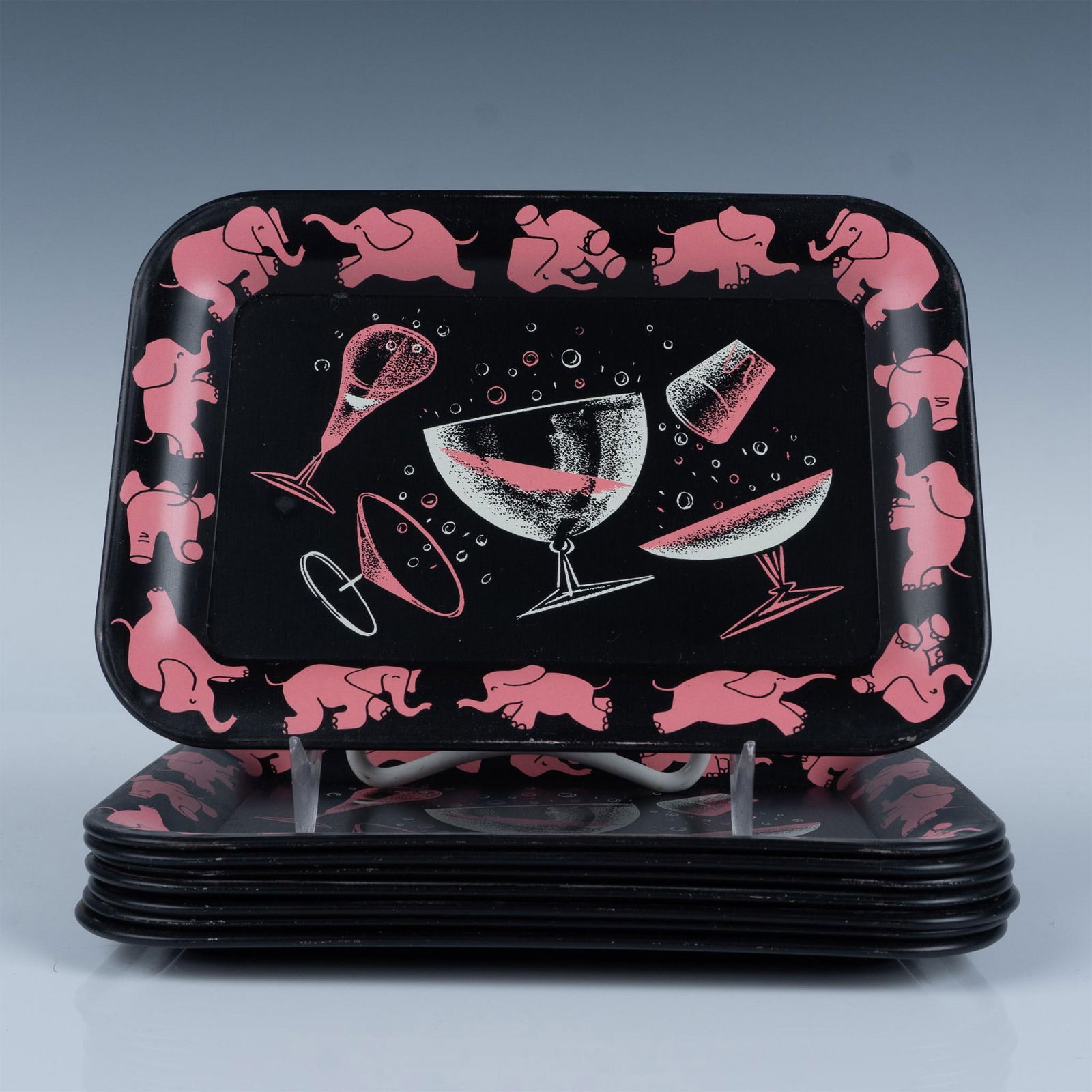 8pc Vintage Bartenders Metal Pink Elephants Cocktail Tray: Adorable 1950s era black cocktail serving and tip trays adorned with shakers and glasses and of course the pink elephants around the edges. Each tray measures 6.75"L x 4.75"W Issued: c. 1950 Dimension