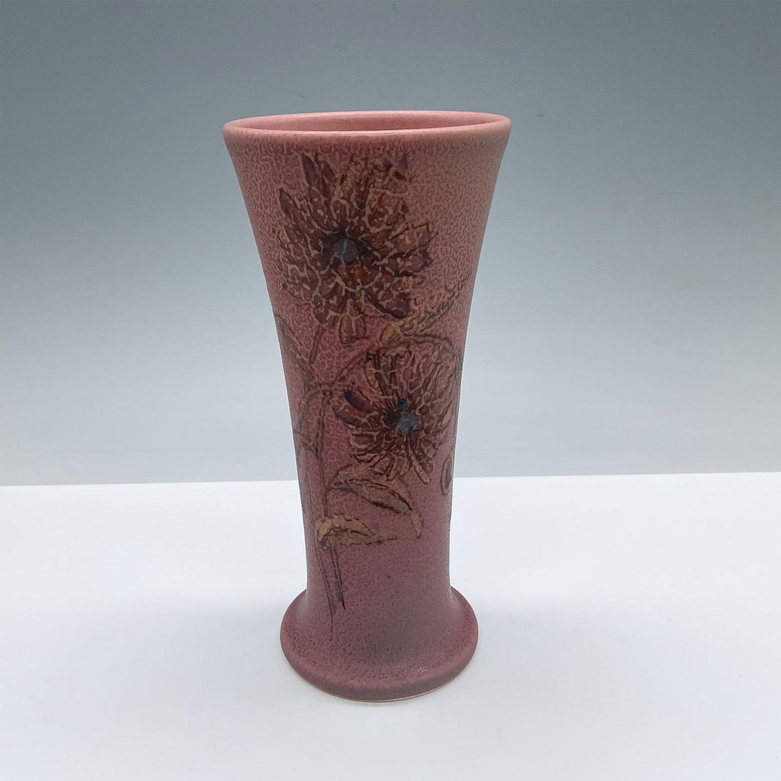 Rookwood Pottery by Barrett Pink Floral Vase 1357: Designed by Elizabeth Barrett, a hand painted small table vase adorned with flowers. Rookwood impressed stamp. Marked XXV. Shape 1357 E. Artist marked. Artist: Elizabeth Barrett Issued: c 1920s Dimens