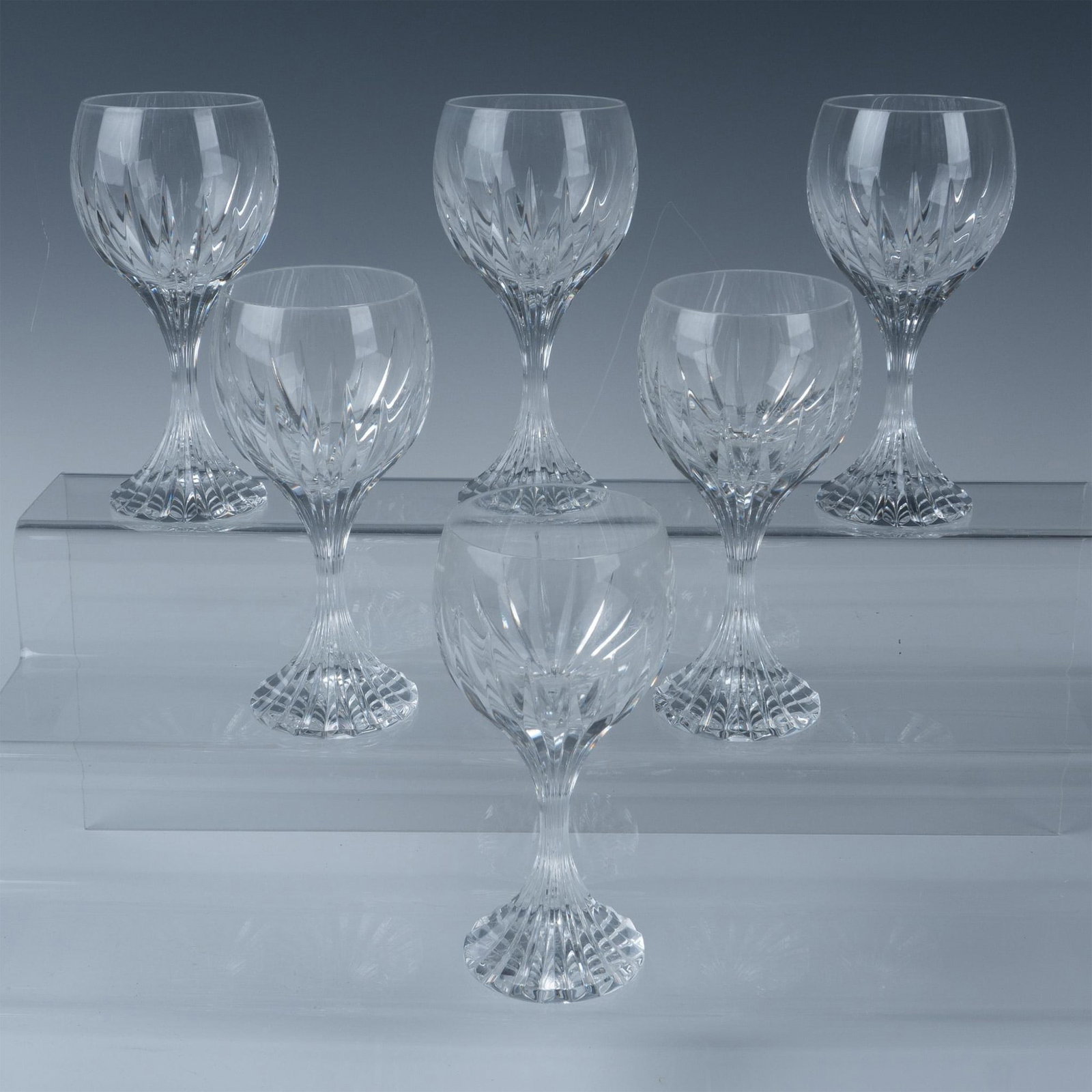 6pc Baccarat Crystal Bordeaux Wine Glasses, Massena: A set of 6 clear stemware decorated in deep vertical cuts. Baccarat marked. This item has its original box: 12.25"L x 8.25"W x 8.5"H. Issued: Late 20th century to early 21st century Dimensions: 3"W x 