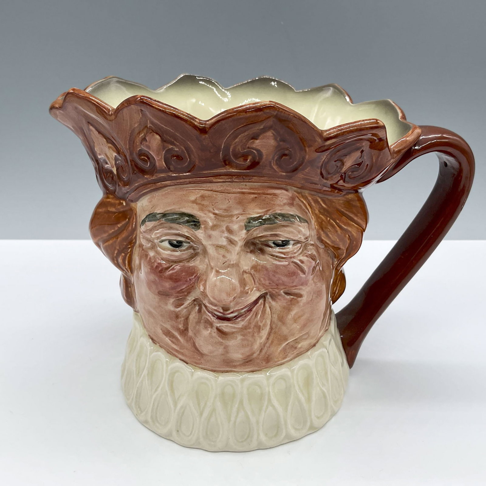 Old King Cole D6036 - Large - Royal Doulton Character Jug: Variation Two. Brown crown. Royal Doulton backstamp. Artist: Harry Fenton Issued: 1939 - 1960 Dimensions: 5.75"H Manufacturer: Royal Doulton Country of Origin: England