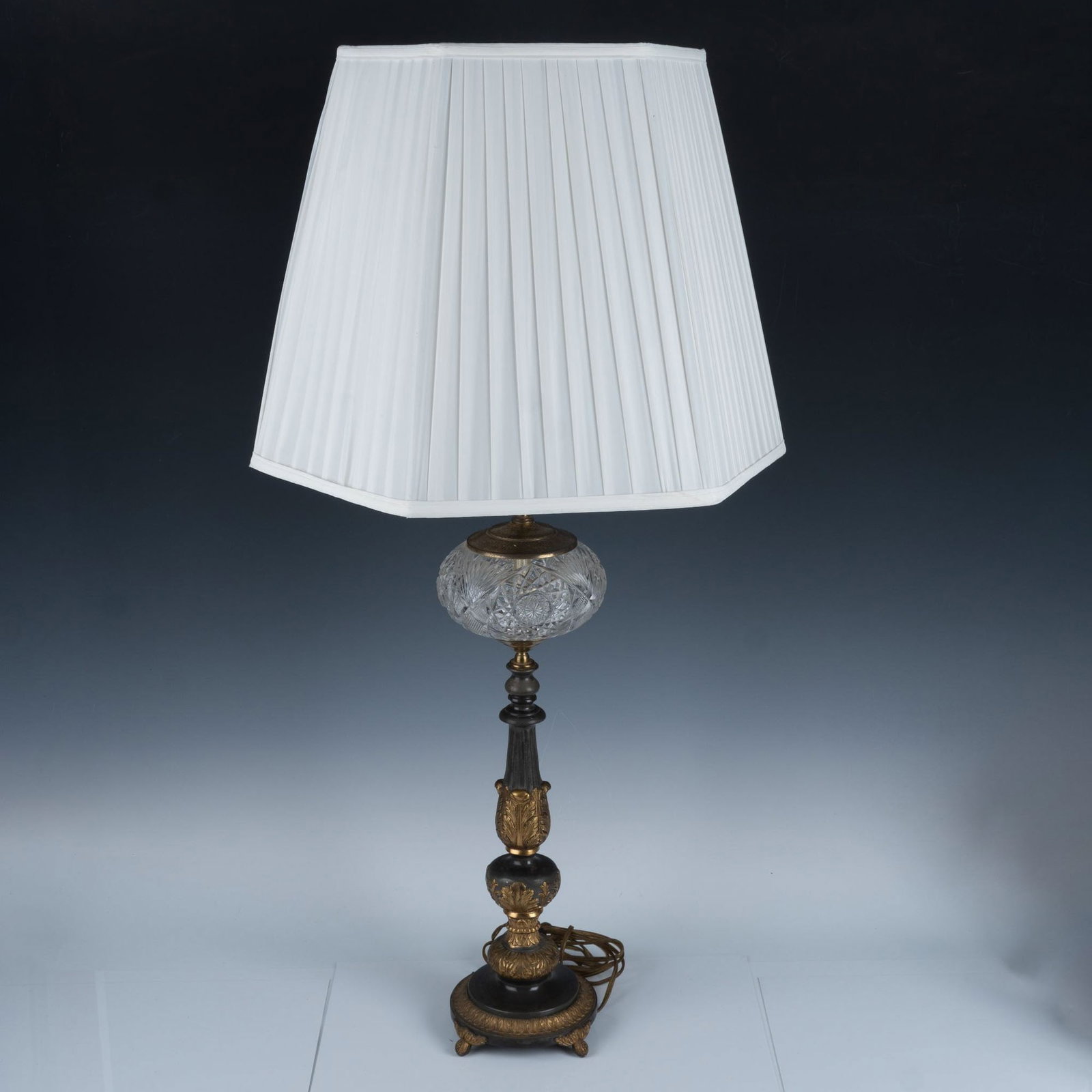 Traditional Leviton Oil Lamp with Electric Plug: Vintage oil lamp made of brass and glass that has a very retro look and feel, sure to add style to your home. Leviton Made in USA backstamp near turn knob. Issued: 20th century Dimensions: 34.5"H x 7"