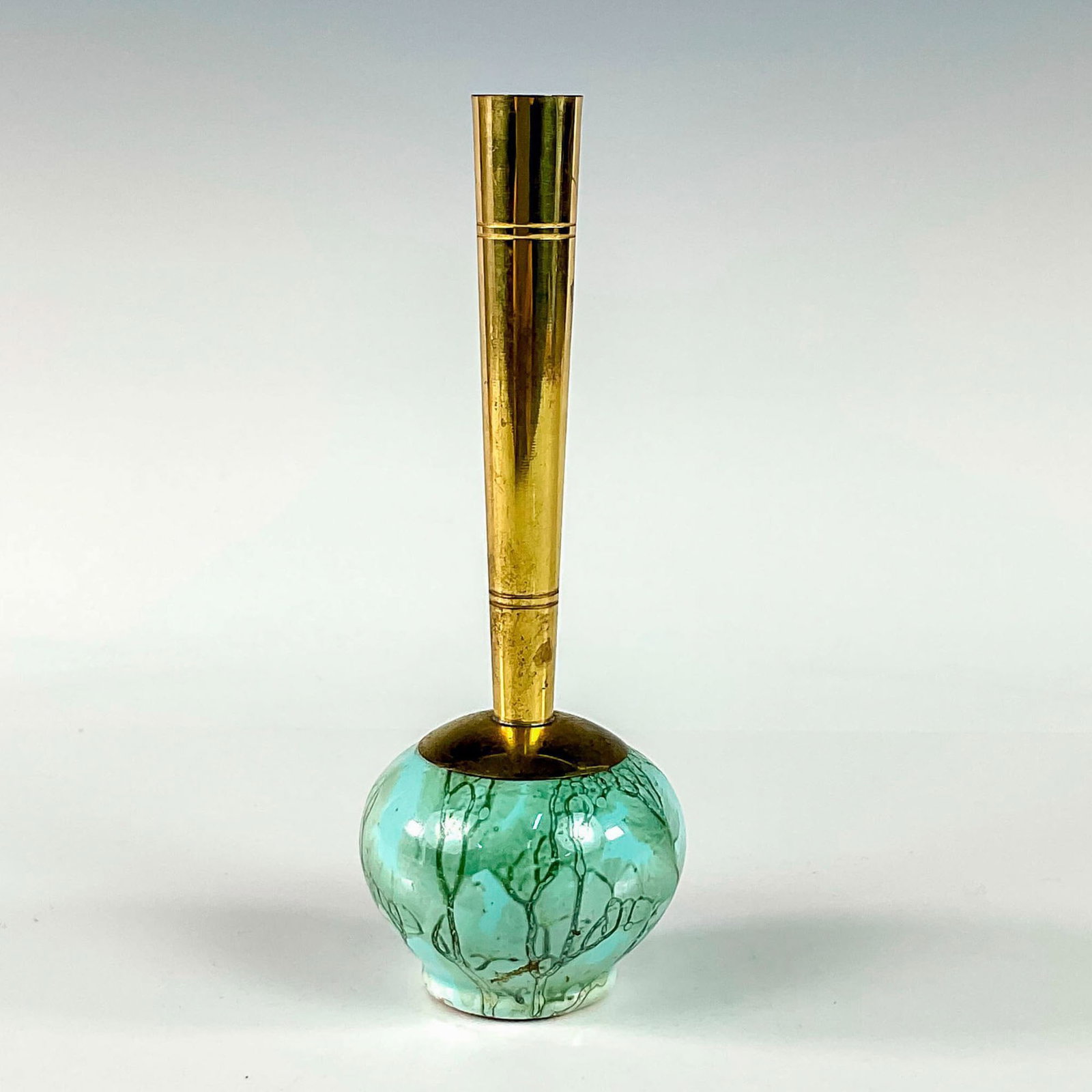 Unusual Delft Mid-Century Modern Lustre Glaze Bud Vase: Turquoise with lustre finish and branch patterning. Round body. Narrow brass spout. Hand Painted Delft Holland on bottom. This item has no reserve. Dimensions: 2.5"W x 6.75"H Manufacturer: Delft Count