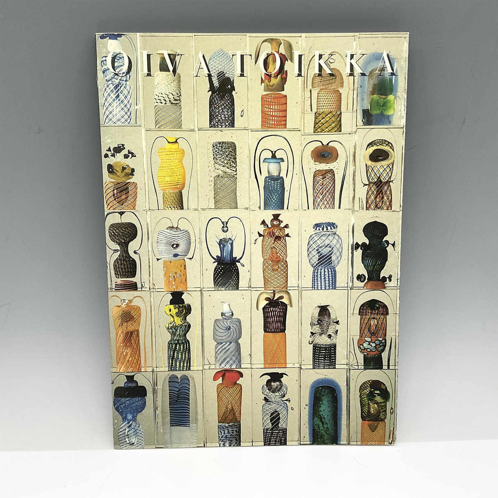 Oiva Toikka Glass From Nuutajarvi, Book: Soft cover, 56-page book on Oiva Toikka glass art pieces. Descriptions, pencil drawings and color photographs included. Issued: 1996 Dimensions: 10"L x 7"W Manufacturer: Amos Anderson Art Museum Count