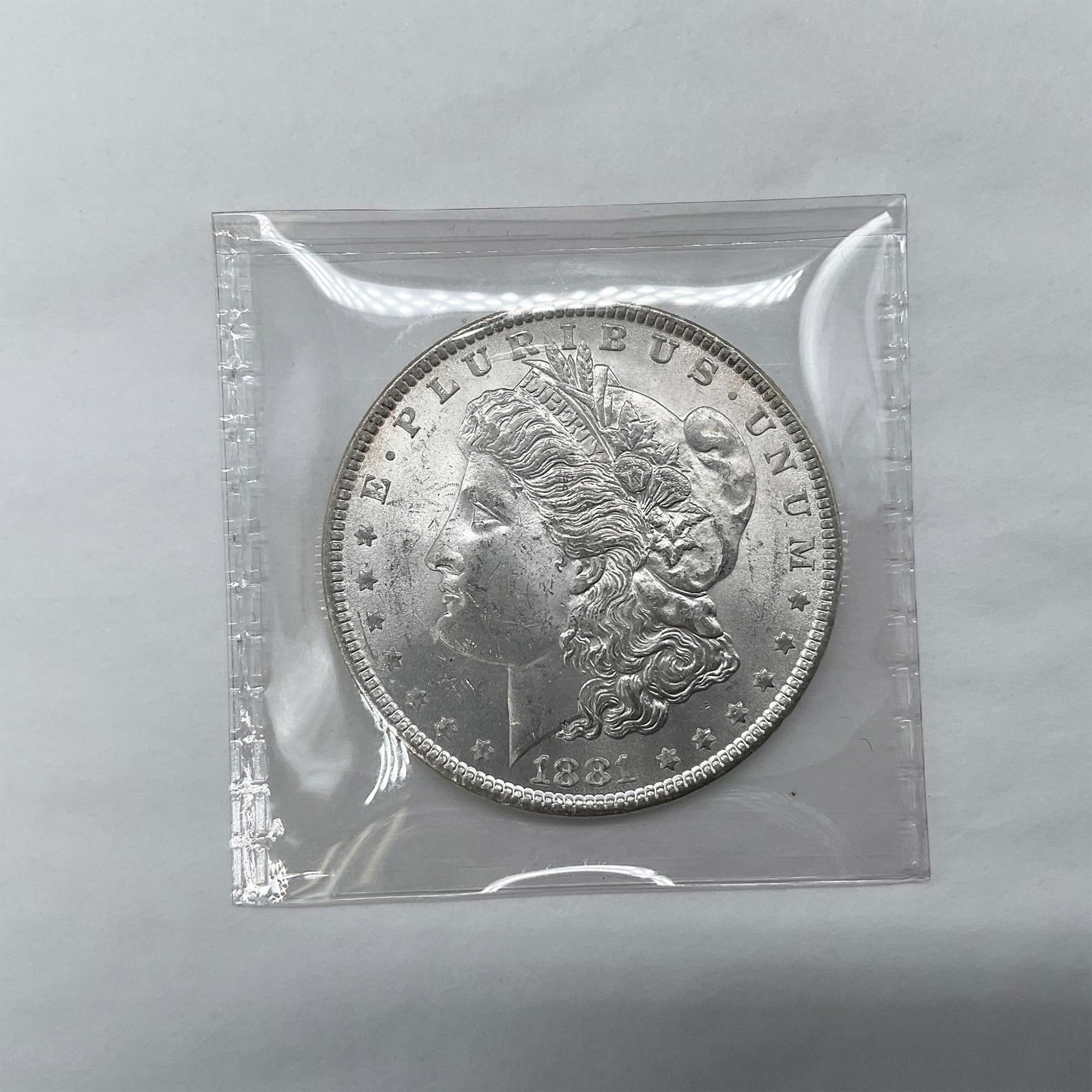 1881 Morgan Silver Dollar Uncirculated 60 (1 of 3)