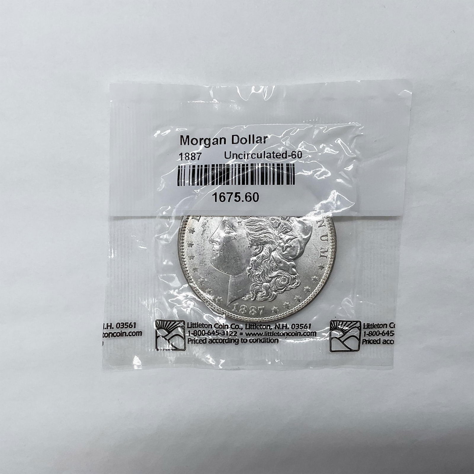 1887 Morgan Silver Dollar Uncirculated 60 (1 of 2)