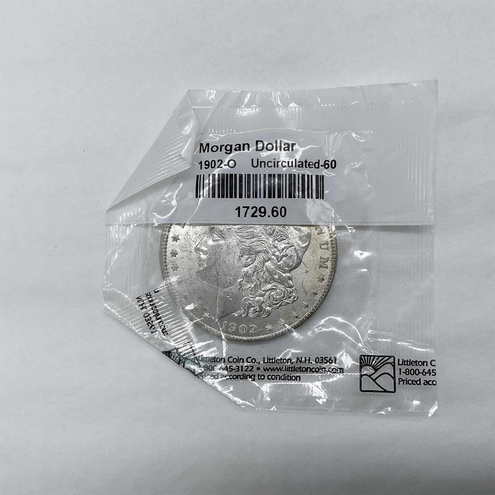 1902-O Morgan Silver Dollar Uncirculated 60 (1 of 2)